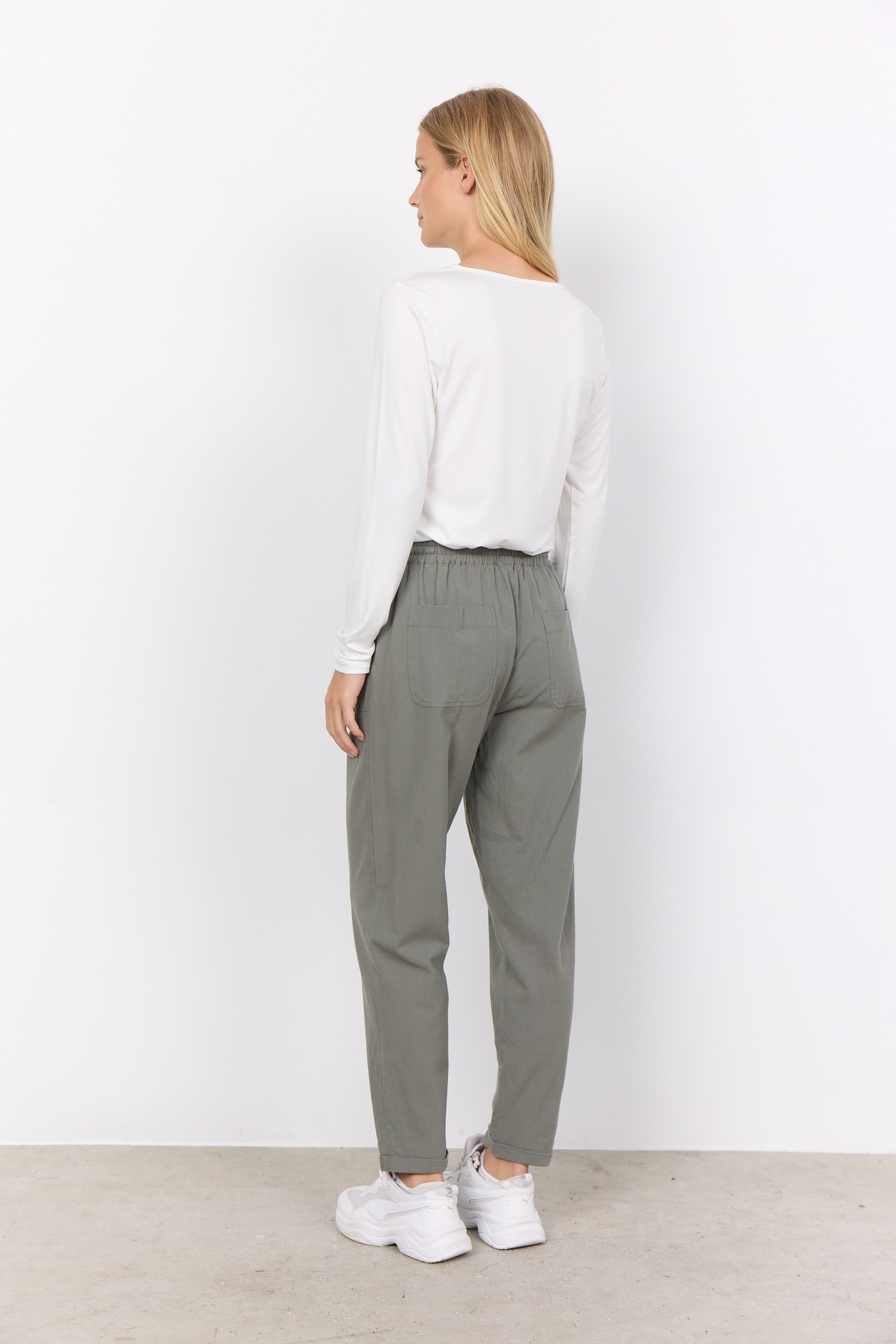 Back view of Soya Concept (17195) Women's Ankle Length, Pull On Textured Cotton Pants in Misty Green