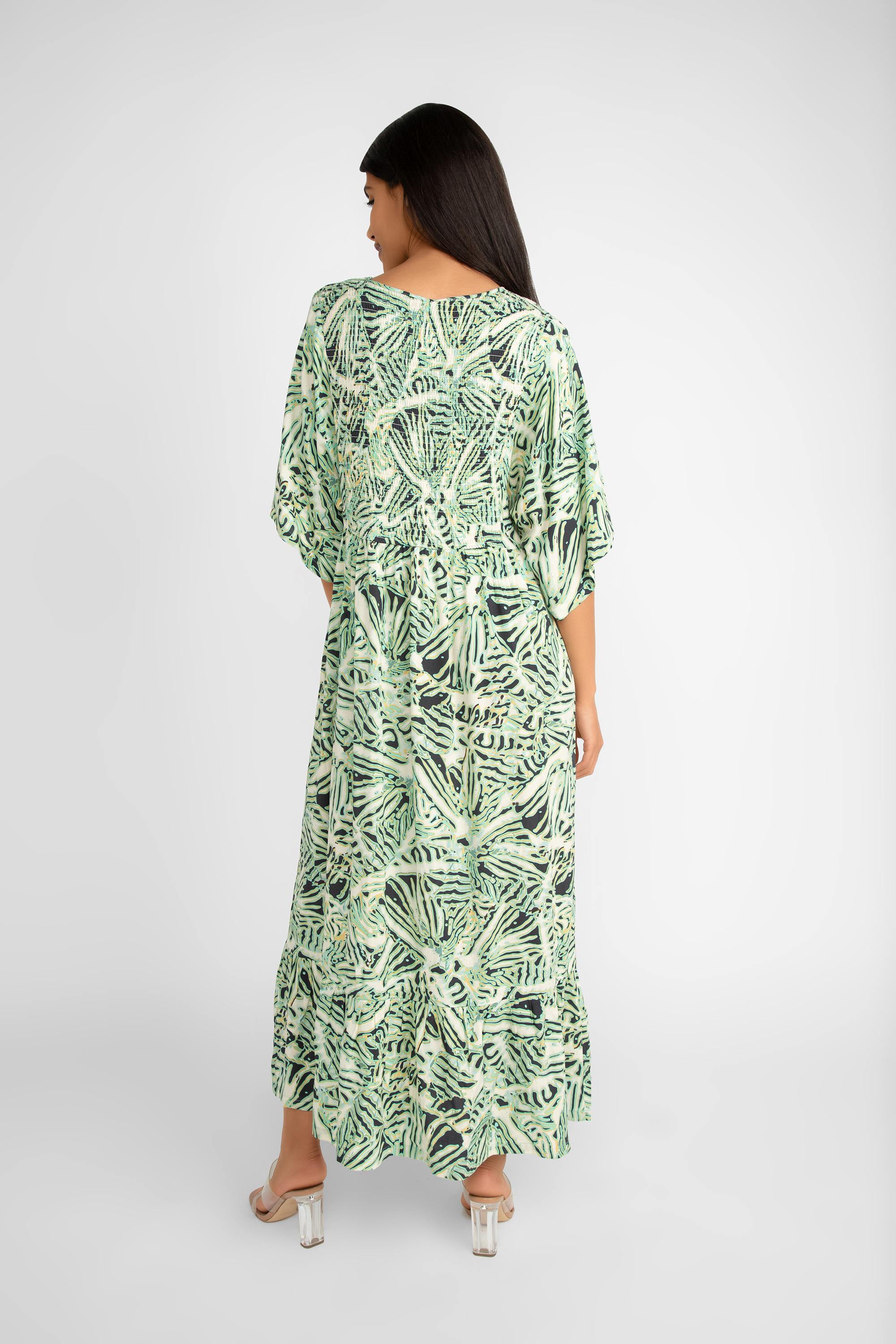 Back view of Soya Concept (40629) Women's Short Sleeve Aqua Foliage Printed Maxi Dress with V-neck and smocked bodice