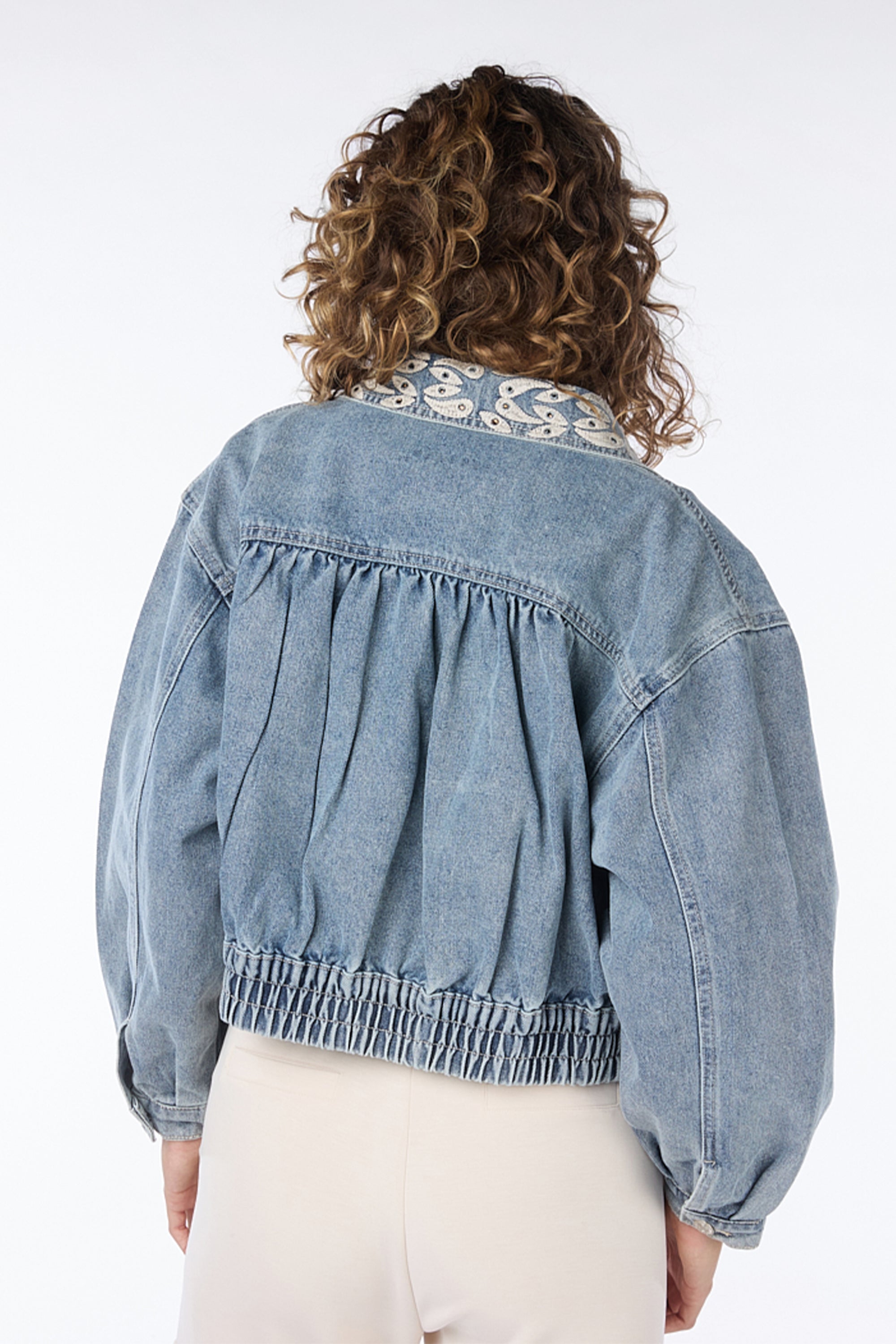 Back view of Esqualo (SP2412002) Women's Long Sleeve Cropped Blue Jean Jacket With Embroidery & Rhinestones on Collar and Front Panels