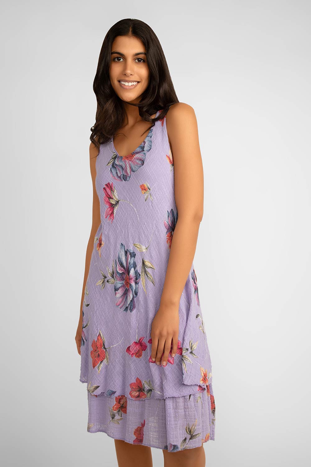 Front view of Me & Gee (S24-16-HL8903) Women's Sleeveless Floral Gauze Dress With Layered Knee Length Skirt in Lilac Purple with Floral Print