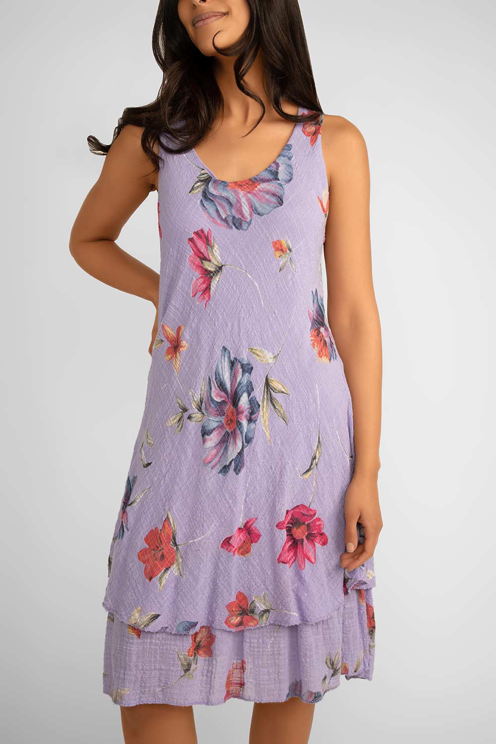 Close up front view of Me & Gee (S24-16-HL8903) Women's Sleeveless Floral Gauze Dress With Layered Knee Length Skirt in Lilac Purple with Floral Print