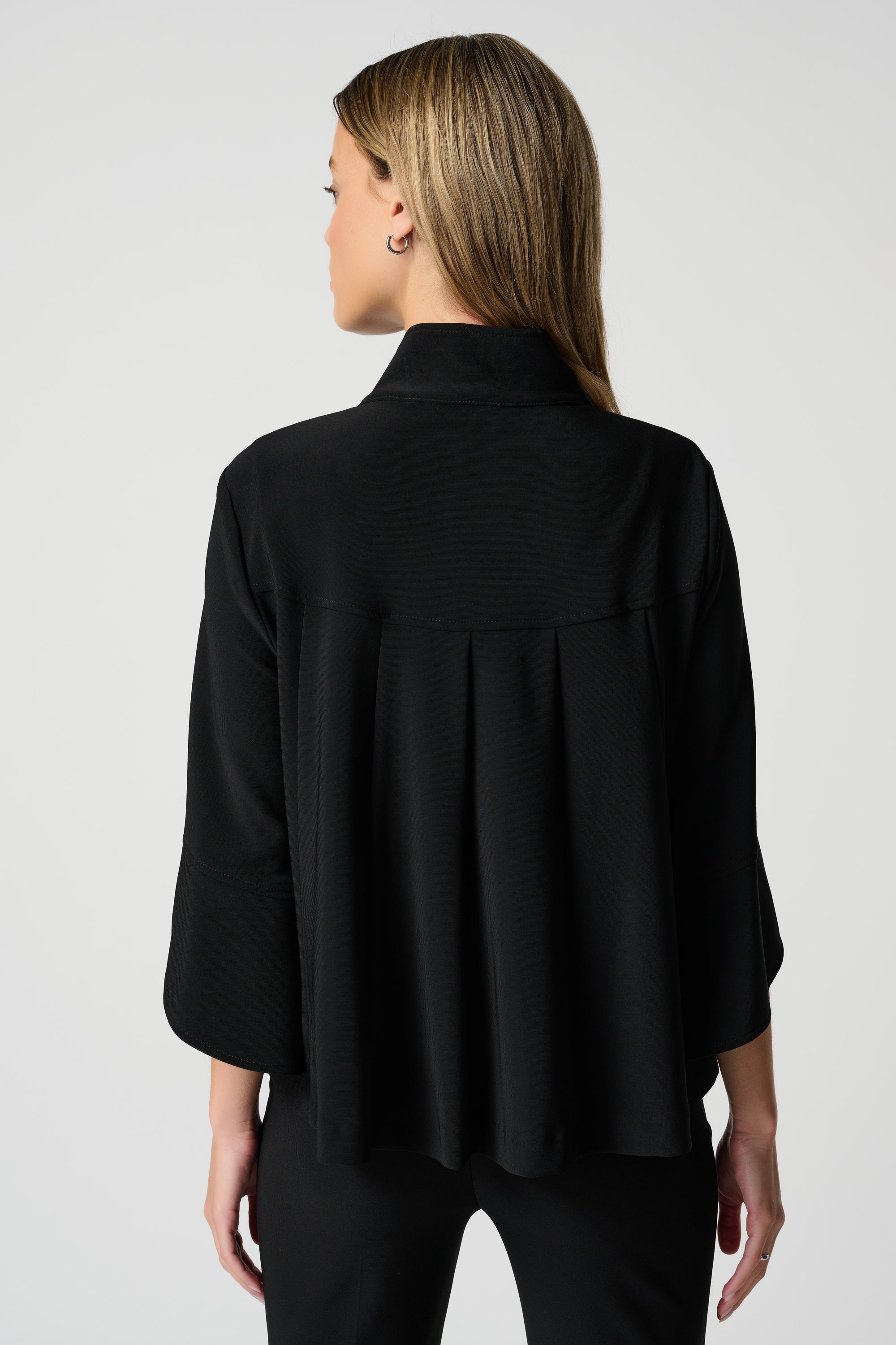 Back view of Joseph Ribkoff (193198NOS) Women's 3/4 Sleeve Classic Trapeze Jacket with Stand Collar & Statement Button in Black