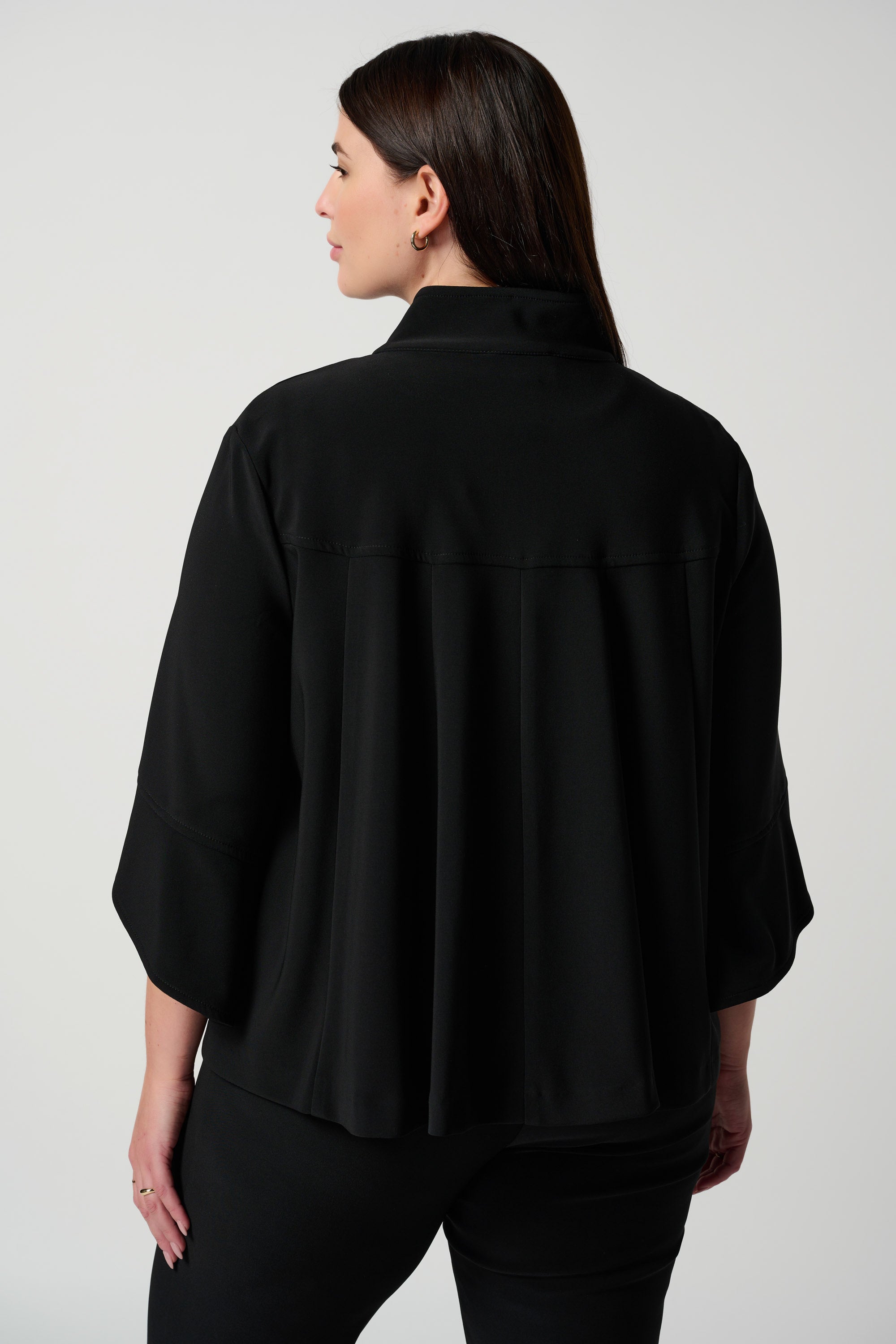 Back view of Joseph Ribkoff (193198NOS) Women's 3/4 Sleeve Classic Trapeze Jacket with Stand Collar & Statement Button in Black