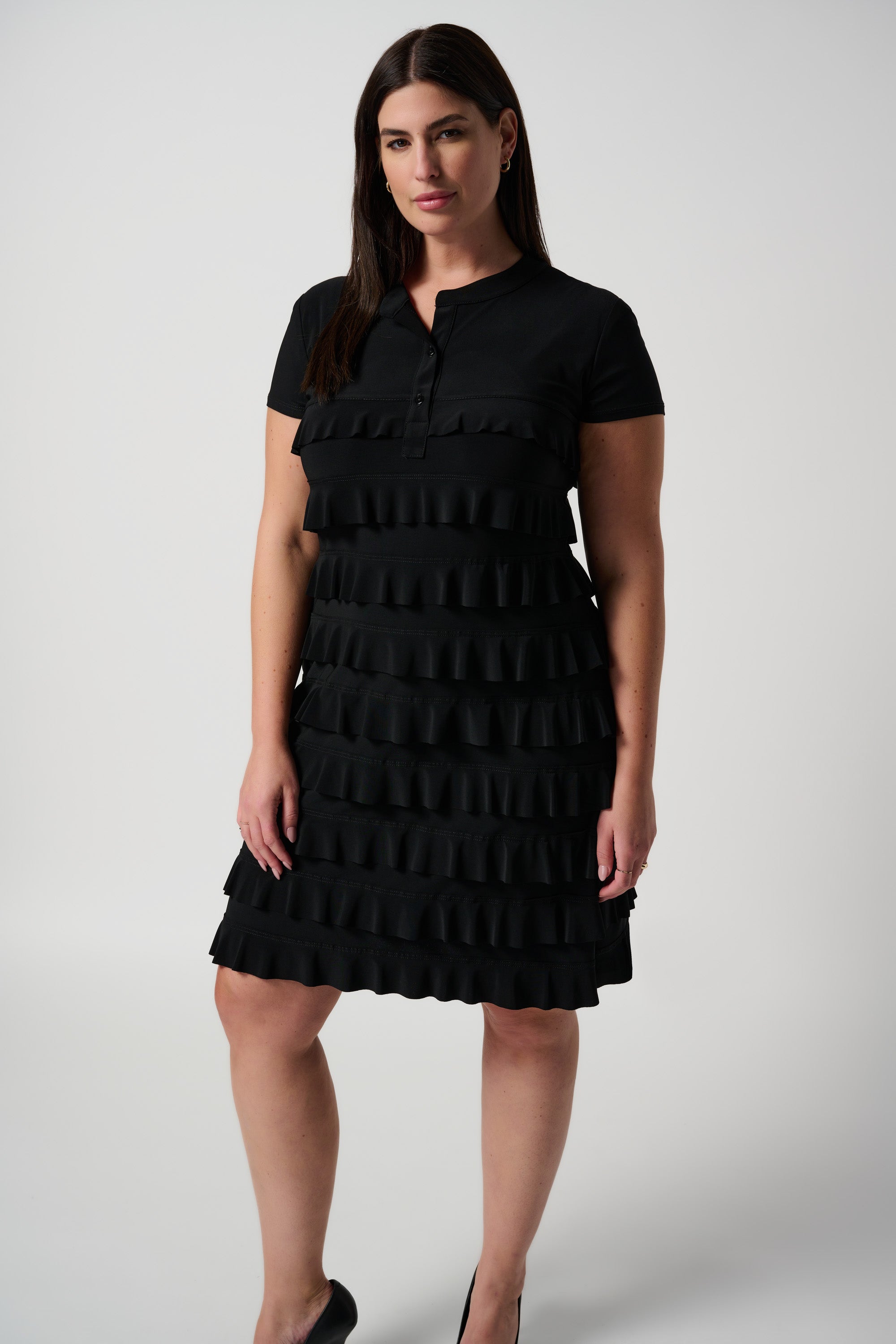 Front view of Joseph Ribkoff (211350NOS) Women's Short Sleeve Knee Length Dress With Stand Collar and Ruffle Detailing in Black