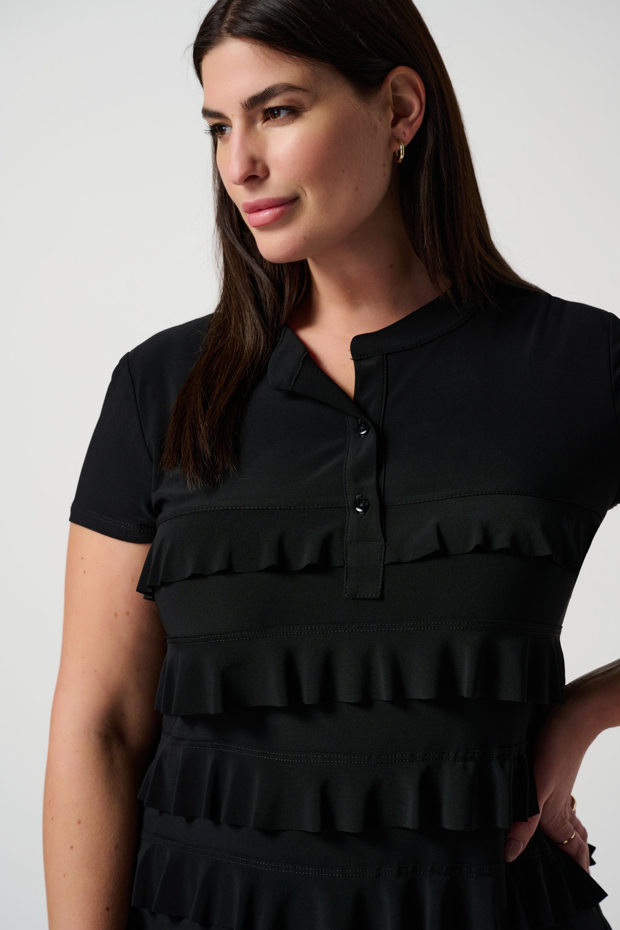 Front close up of Joseph Ribkoff (211350NOS) Women's Short Sleeve Knee Length Dress With Stand Collar and Ruffle Detailing in Black