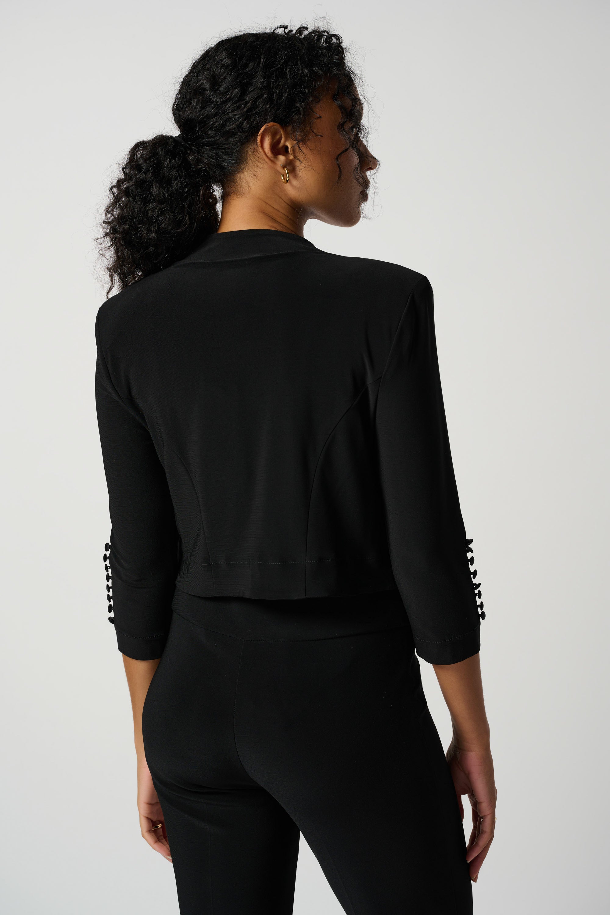 Back view of Joseph Ribkoff (213707NOS) Women's 3/4 Sleeve Classic Bolero Jacket in Black