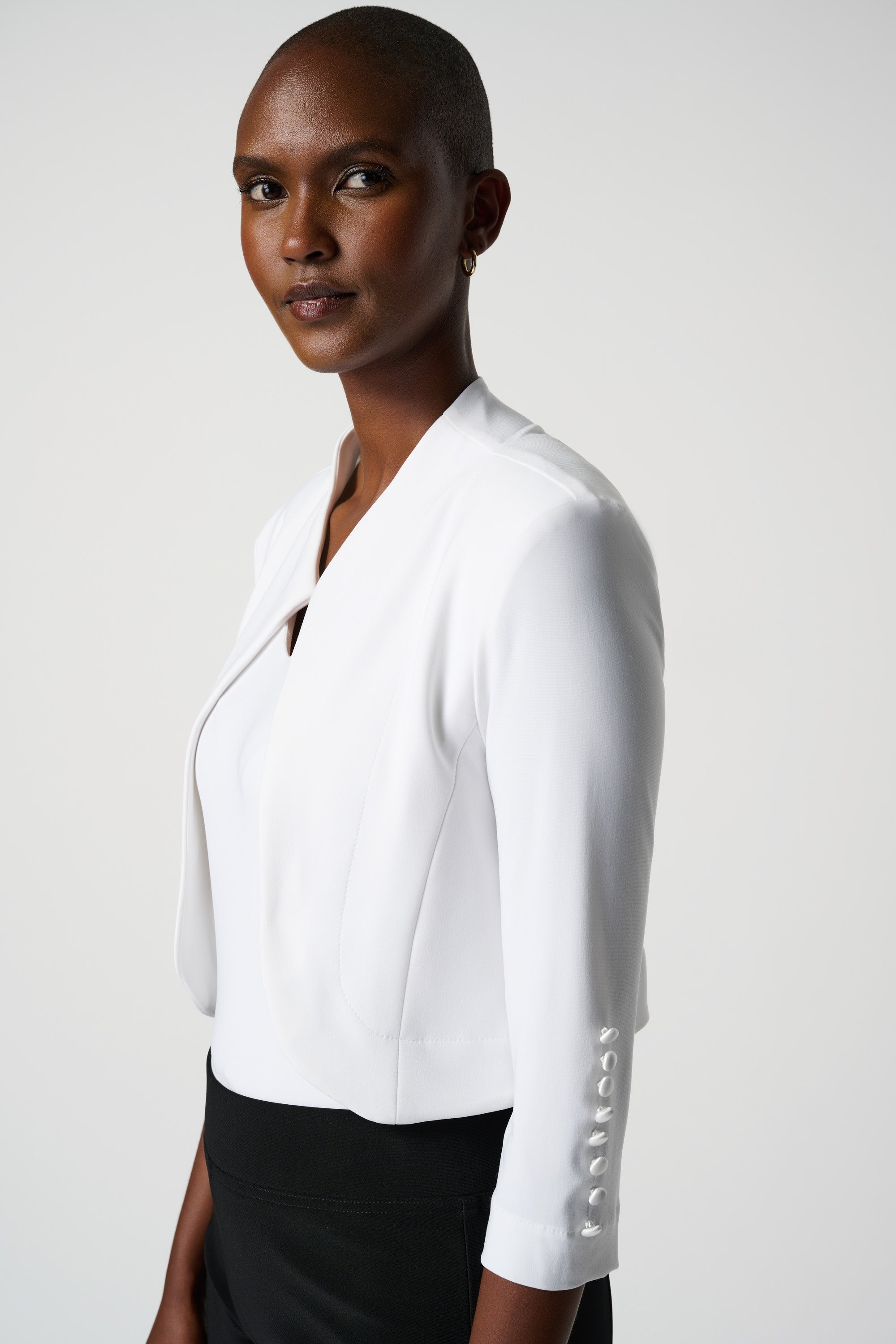 Side view of  Joseph Ribkoff (213707NOS) Women's 3/4 Sleeve Classic Bolero Jacket in Vanilla White