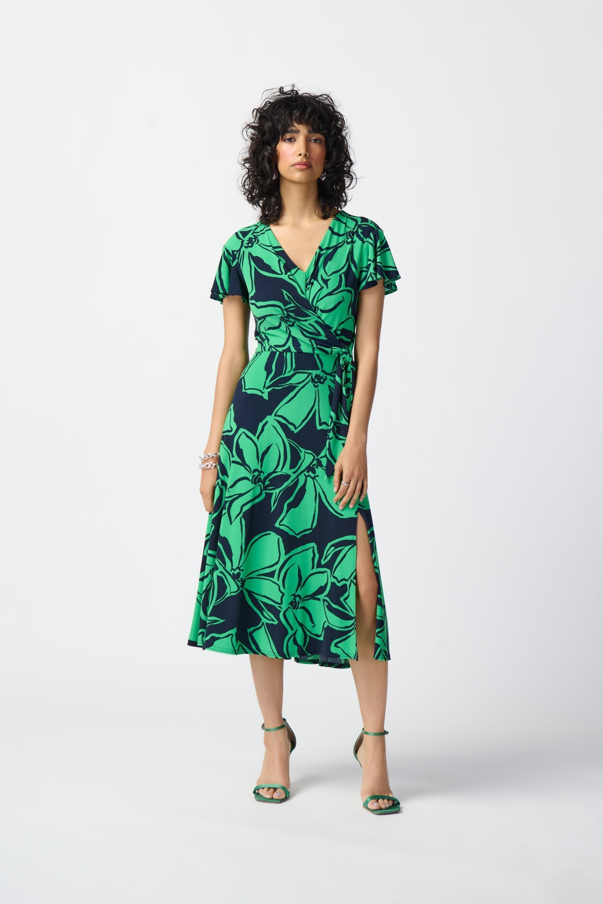 Front view of Joseph Ribkoff (241052) Women's Short Sleeve Green Floral Midi Wrap Dress with Side Tie