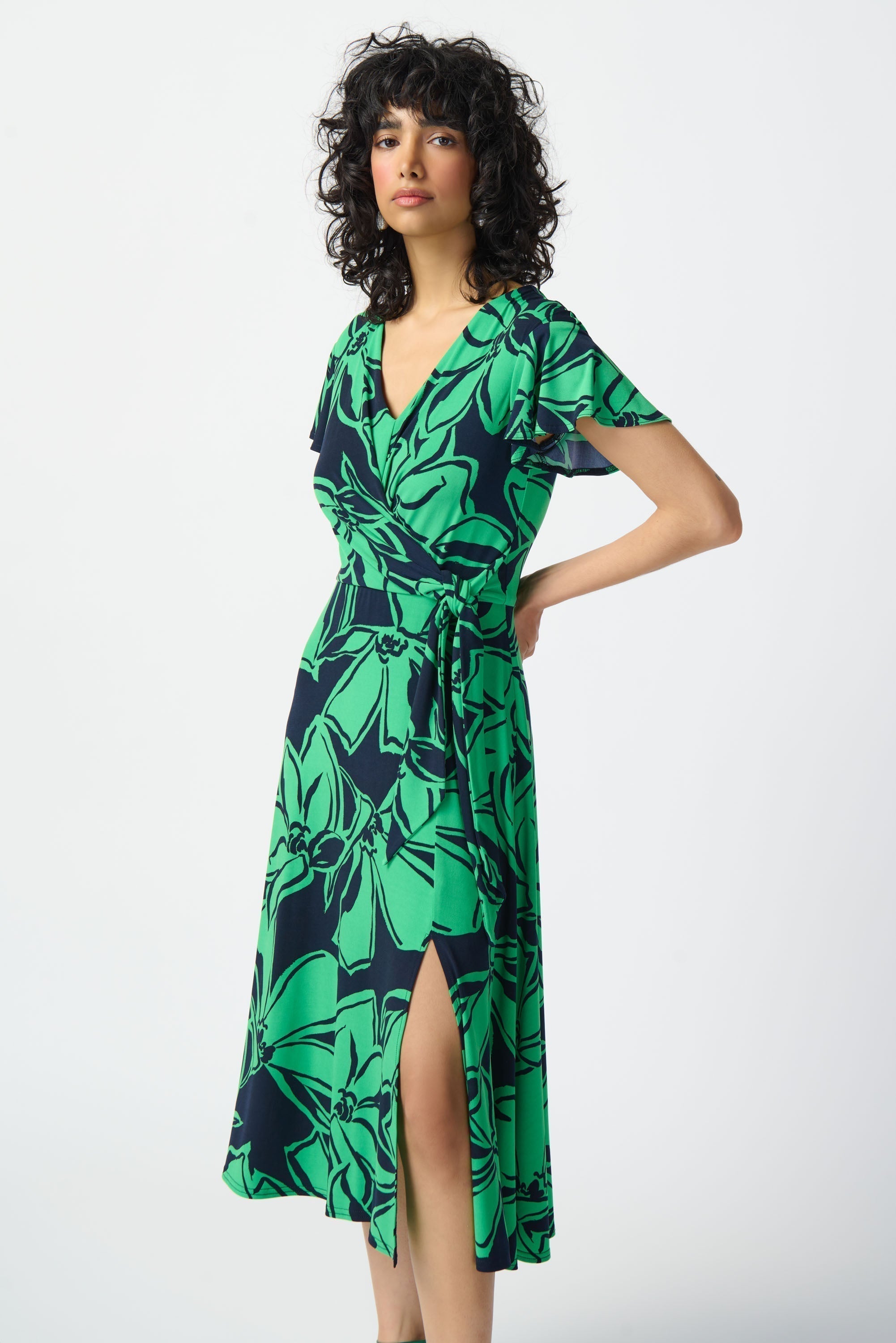 Front view of Joseph Ribkoff (241052) Women's Short Sleeve Green Floral Midi Wrap Dress with Side Tie