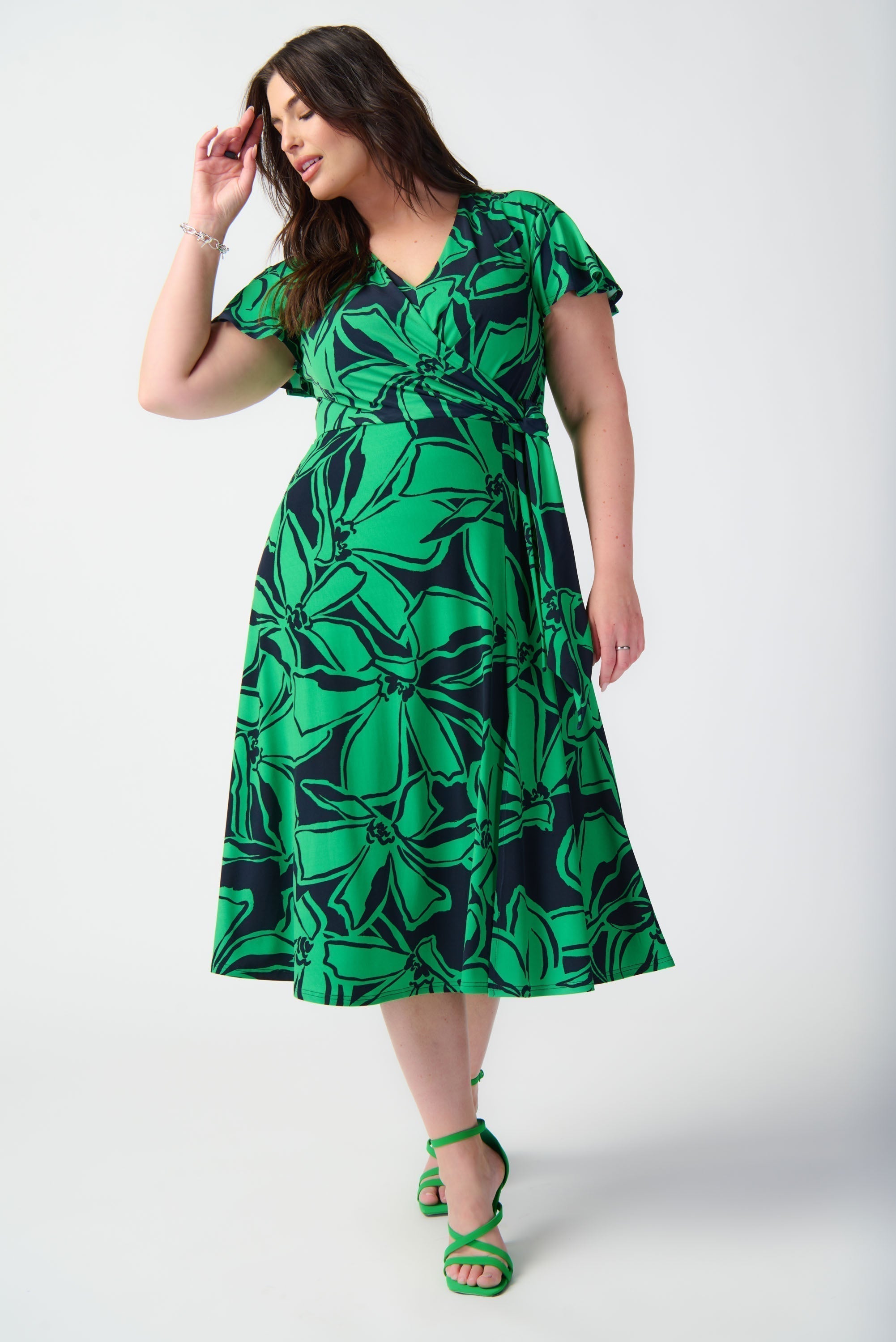 Front view of Joseph Ribkoff (241052) Women's Short Sleeve Green Floral Midi Wrap Dress with Side Tie