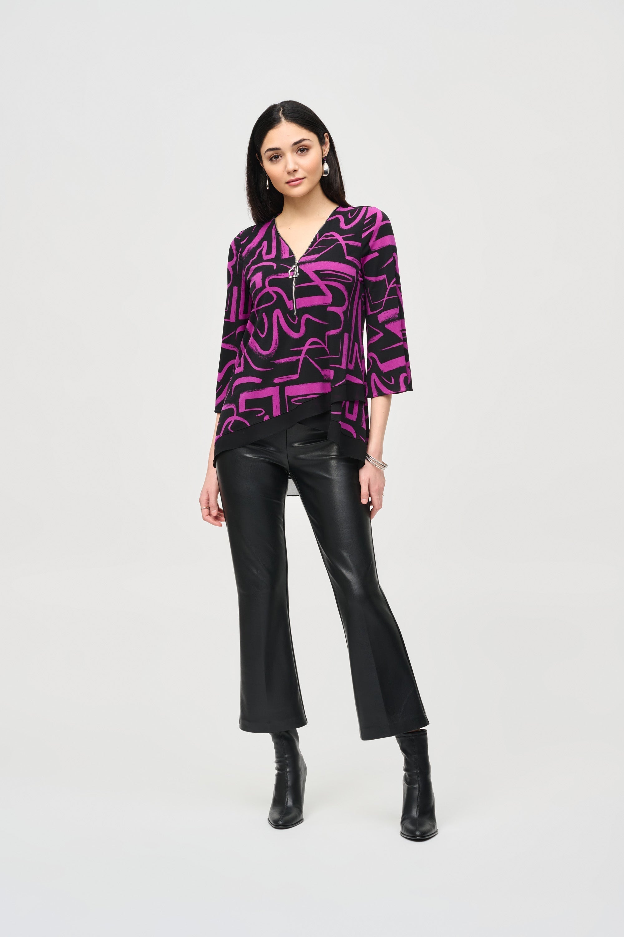 Full body front view of Joseph Ribkoff (243059) Women's 3/4 Sleeve Silky Knit Flared Top in a Bright Purple and Black Print 