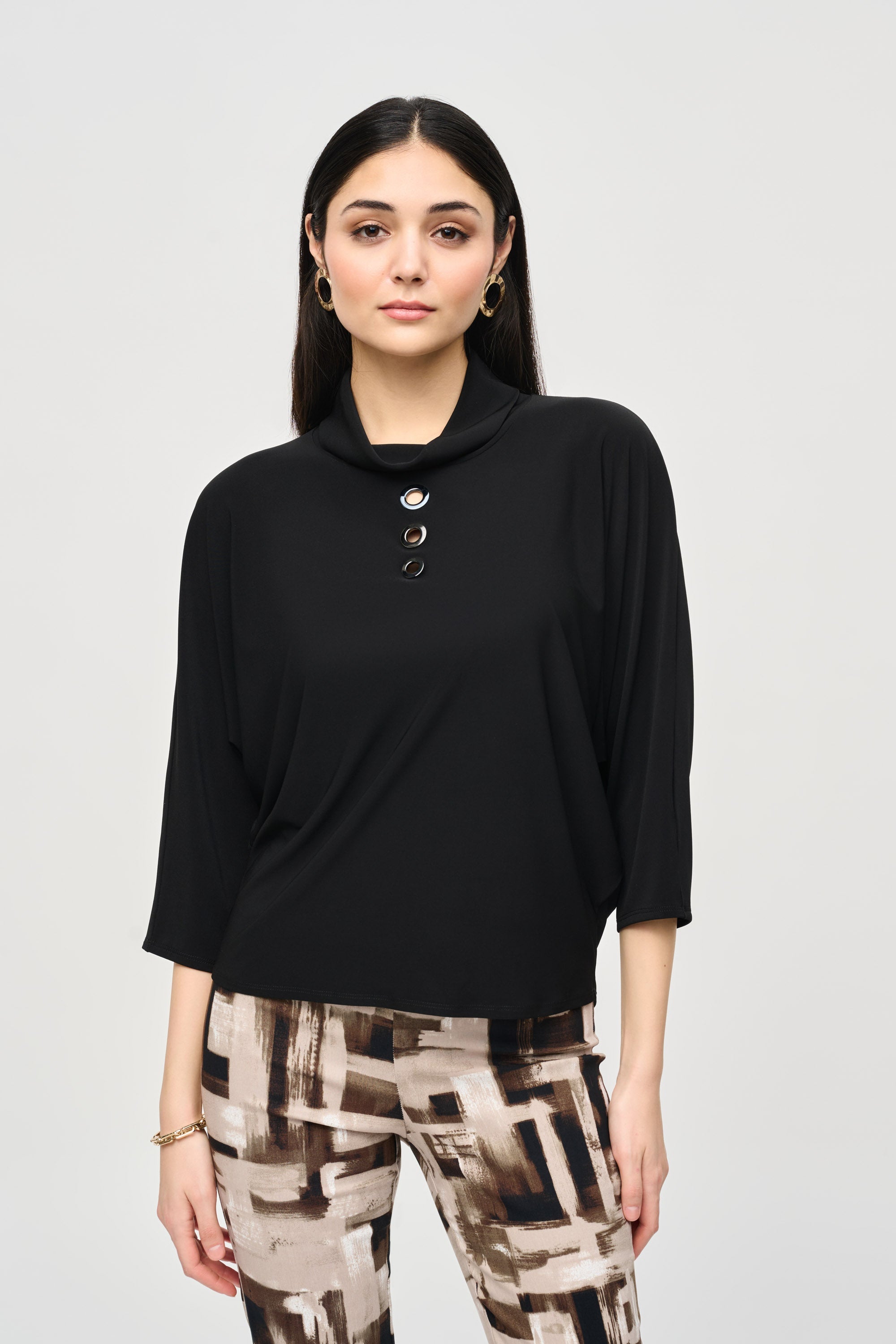 Joseph Ribkoff (243159) Women's 3/4 Dolman Sleeve Turtleneck Top with Eyelet Detail and Boxy Silhouette in Black