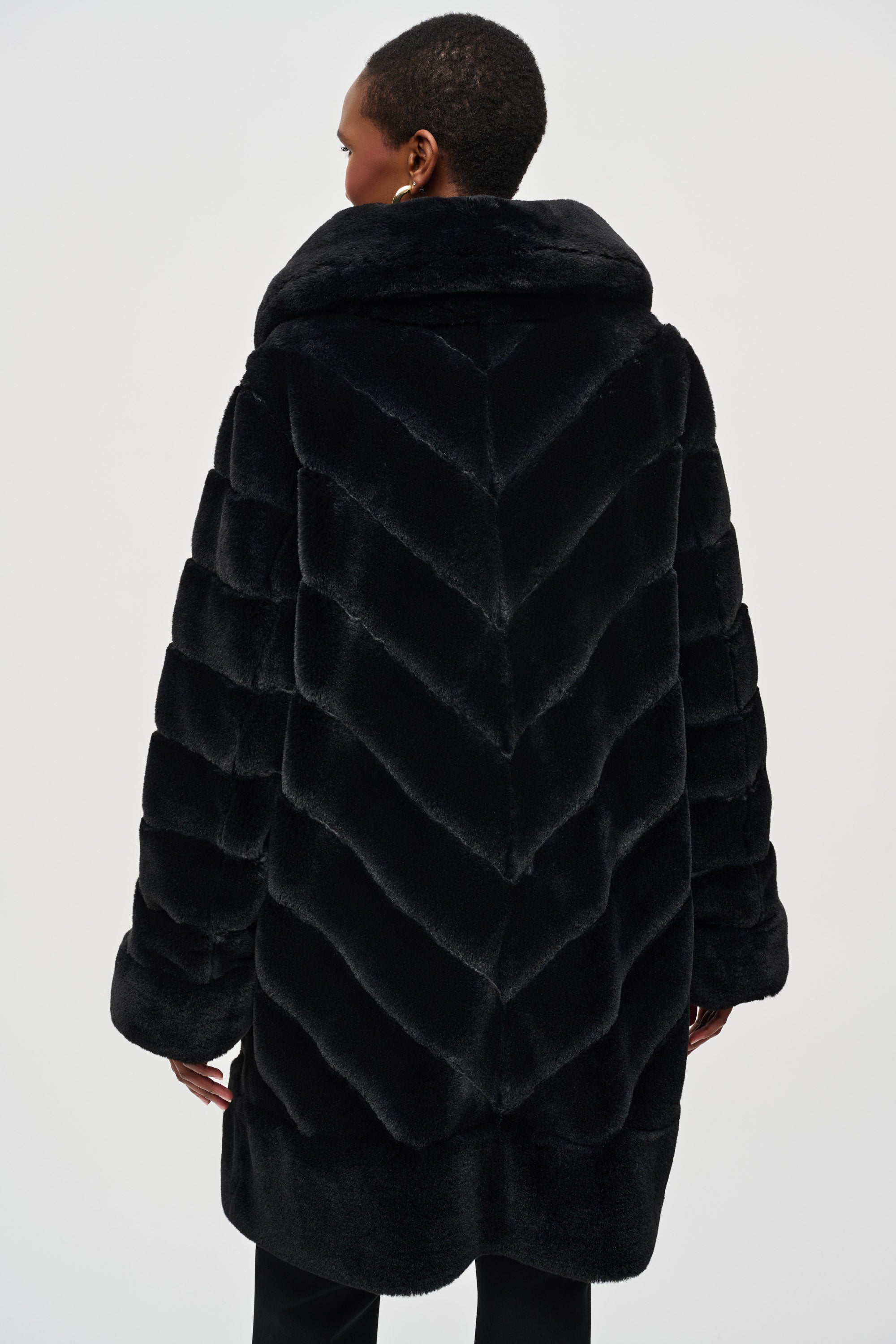 Back view of Joseph Ribkoff (243904) Women's Long Sleeve Reversible Faux Fur & Metallic Coat with Stand Collar in Black