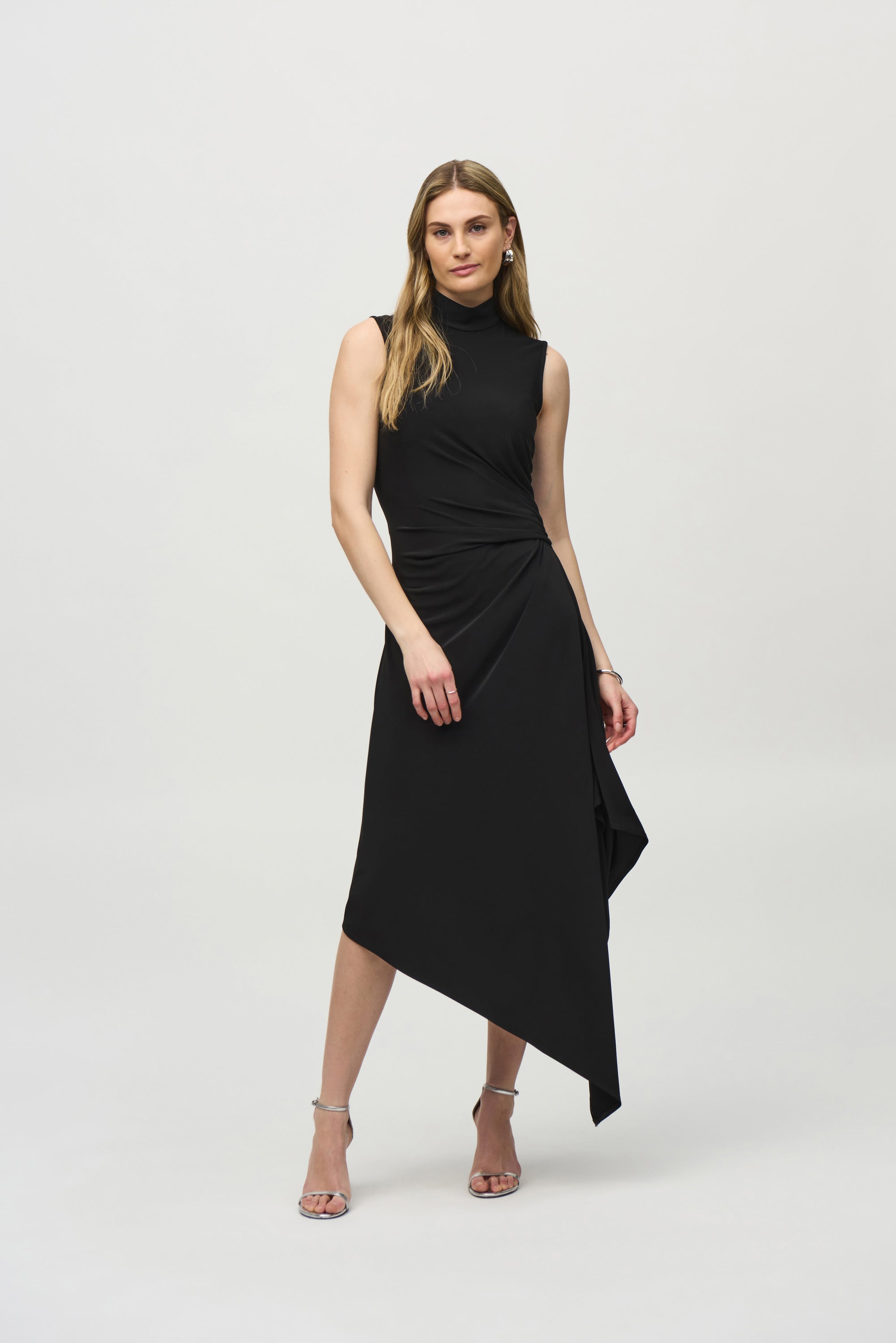 Joseph Ribkoff (244038) Sleeveless Silky Knit Fit and Flare Dress with Turtleneck and asymmetrical hemline in Black