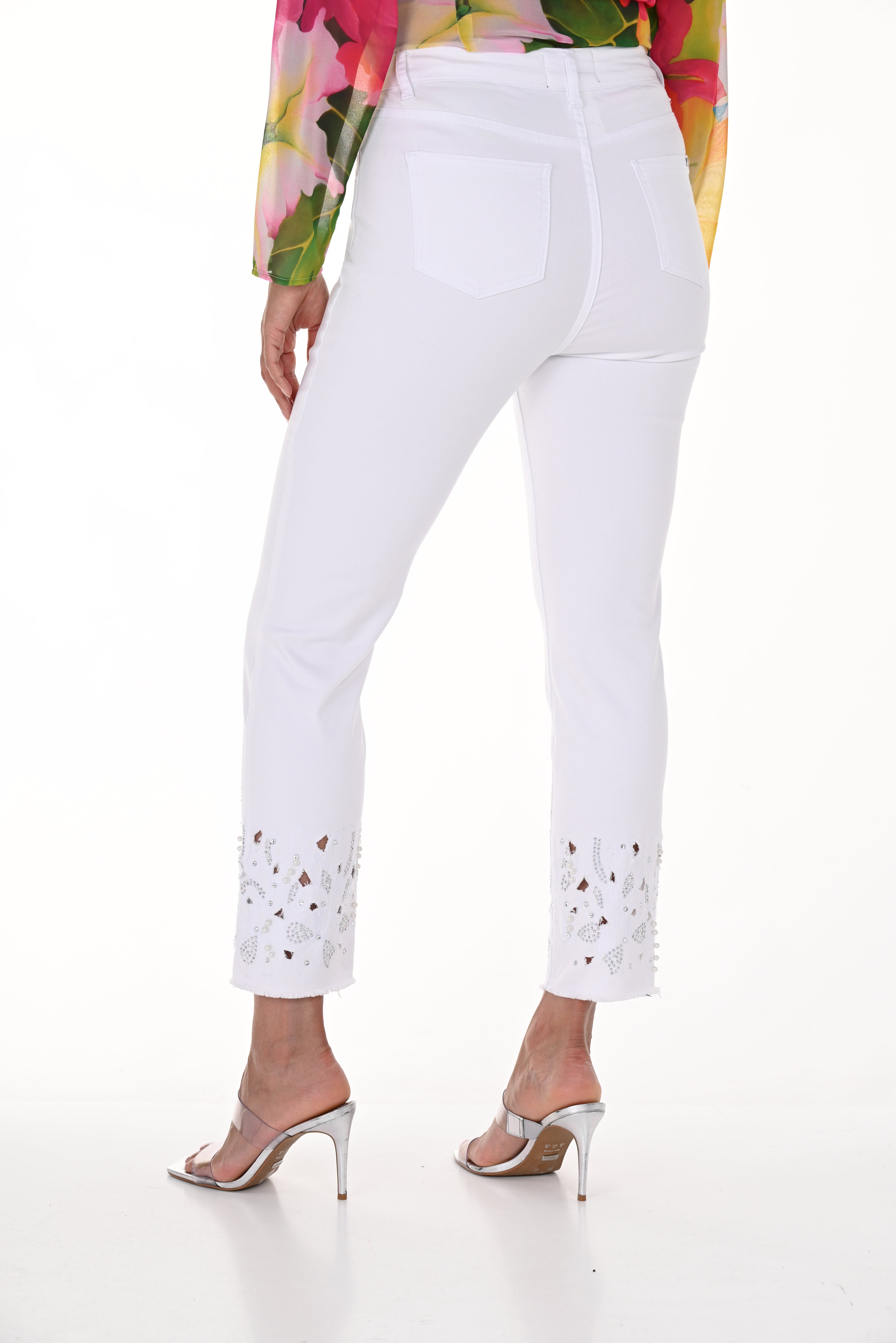 Back view of Frank Lyman (246212U) Women's Ankle Length Slim Fit Pants with Ornate Hem with Iridescent Rhinestones, Purple Beads and Floral Embroidery in White