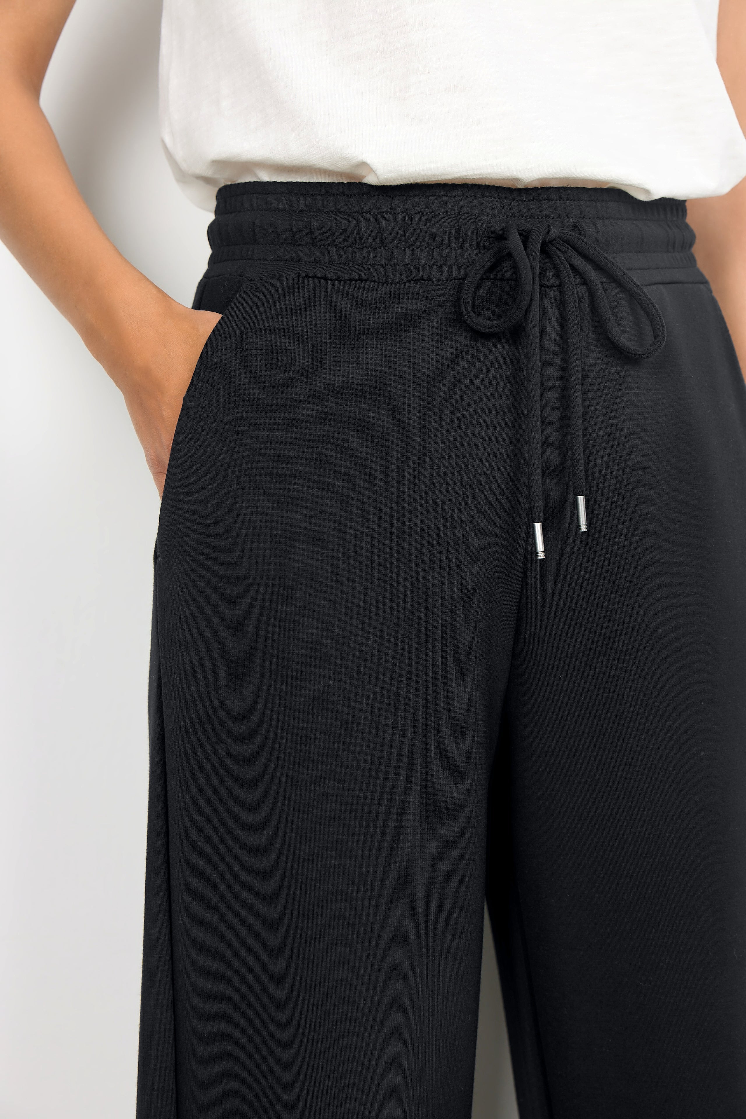 Close up of Soya Concept (25328) Women's High Waist, Wide Leg Banu Brushed Knit Drawstring Pants in Black