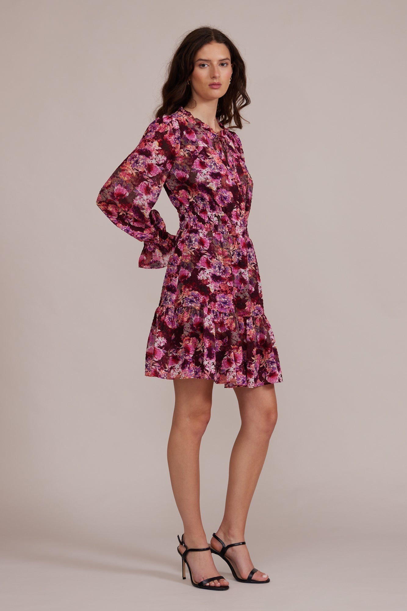 Lucy Paris (DR8007) Women's Long Puff Sleeve Mini Dress With Split V-Neck and Ruffle Trim in a Pink Floral Print