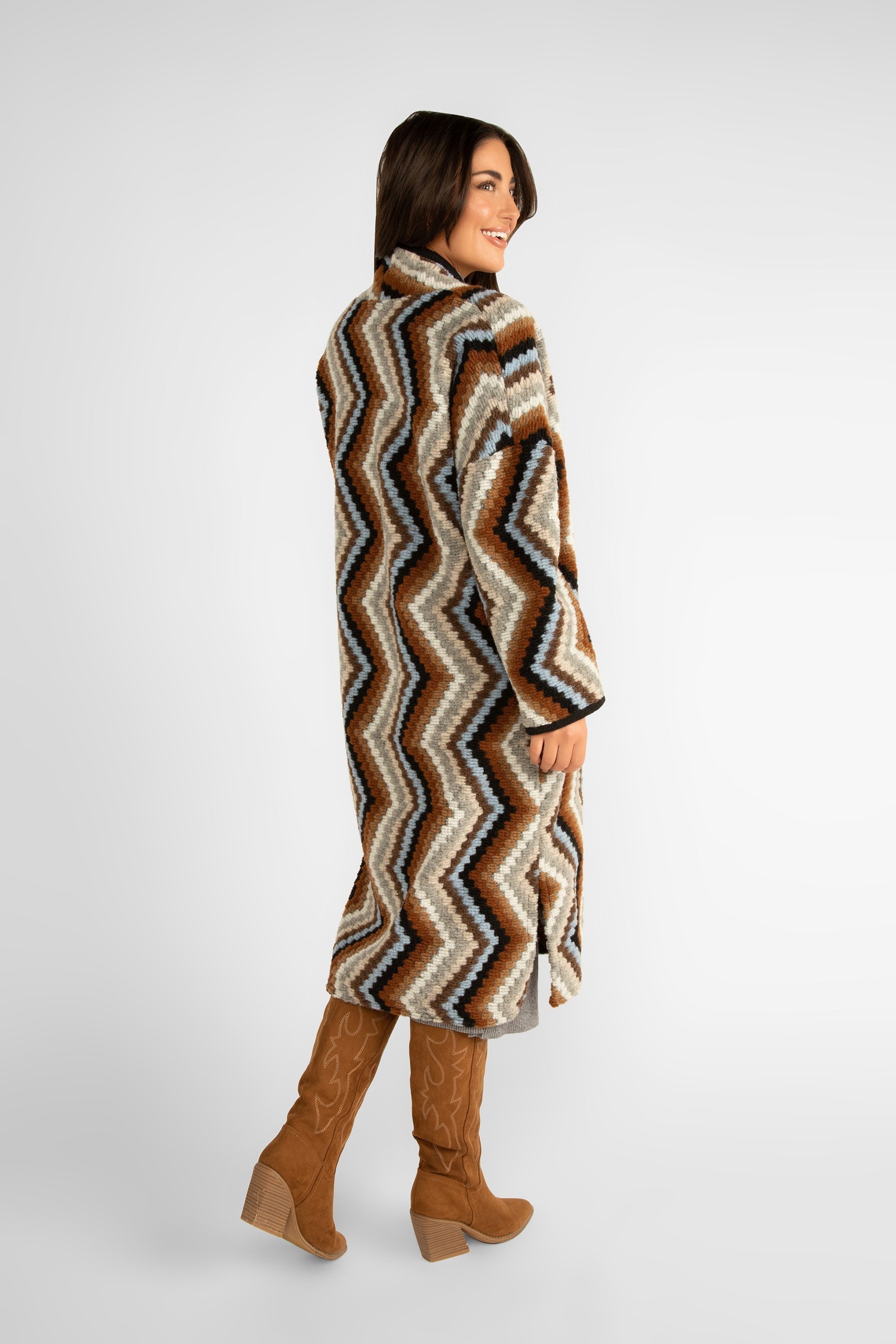 Back view of Astrid (17-W232F) Coachella Coat - Women's Long Sleeve, Open Front, Long Line Cardigan in a Quilted Chevron Pattern of Browns & Blue