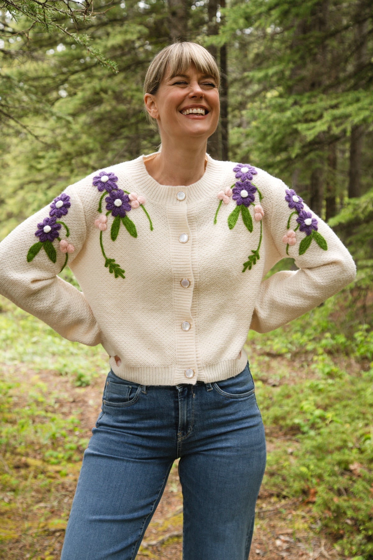 Astrid (17-WT045F) Women's Woodstock Cardigan - Cream medium weight knit with long sleeve and crew neck with pink and purple floral embroidery along shoulders