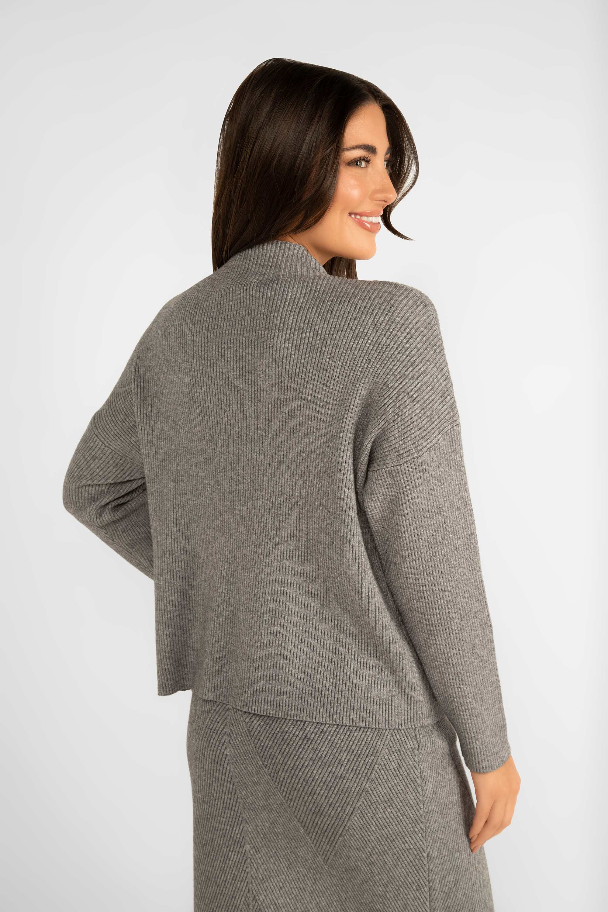 Back view of Astrid (33-AL0599F) Women's Mellow Long Sleeve Mock Neck Sweater - A ribbed knit sweater with drop shoulders and a relaxed silhouette in grey