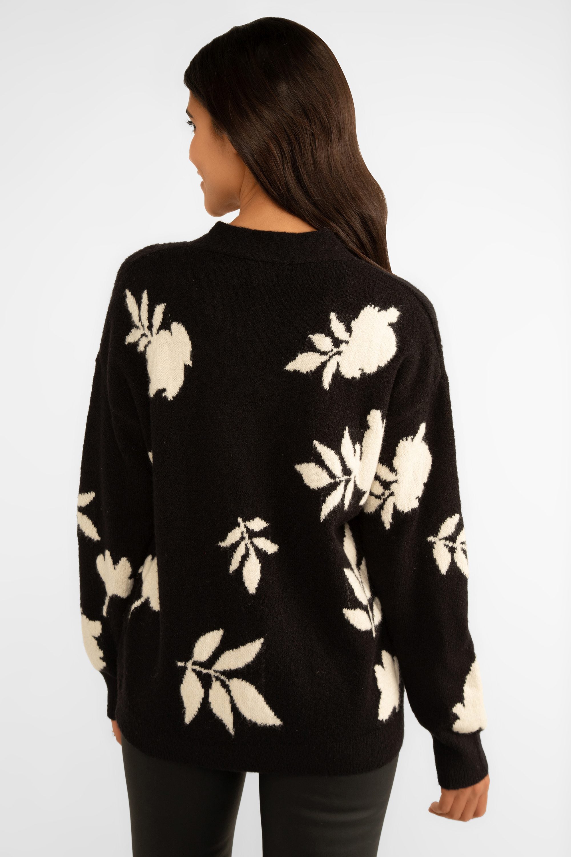 Back view of Carre Noir (7519) Women's  Long Sleeve  V-neck Foliage and Flower Motif Cardigan in Black & White