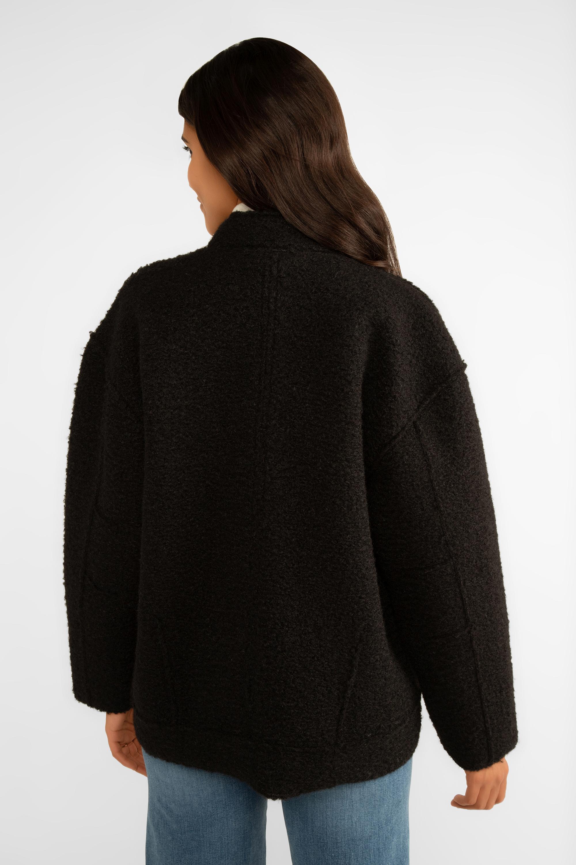 Back view of Carre Noir (7571) Women's Long Sleeve Unlined Boucle Jacket With Removeable Skirt Pin Chest Embellishment with Pearl beads in black