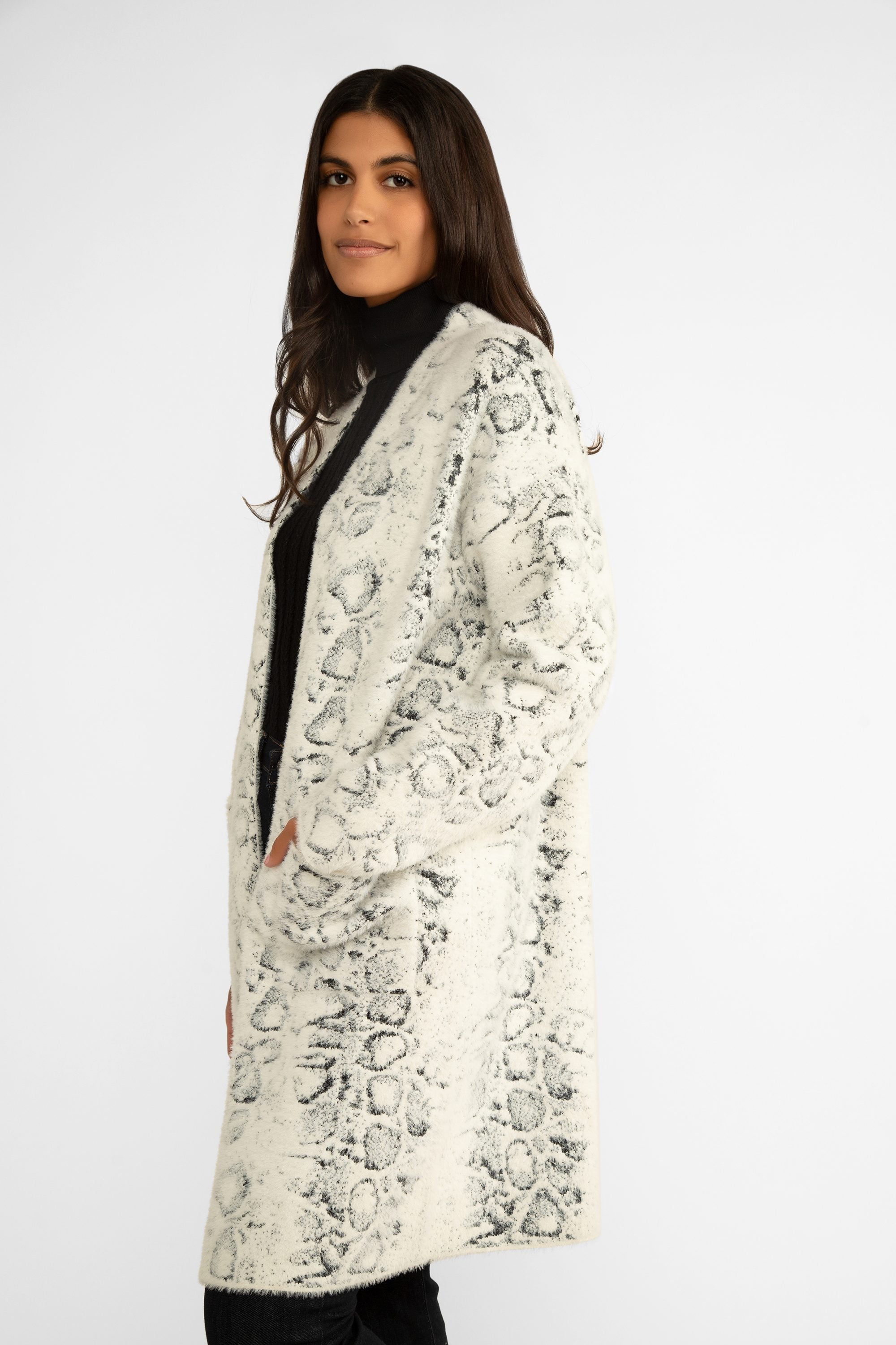 Side view of Carre Noir (7611) Women's Long Sleeve Long Line Open Fuzzy Knit Cardigan in Snowy Animal Print