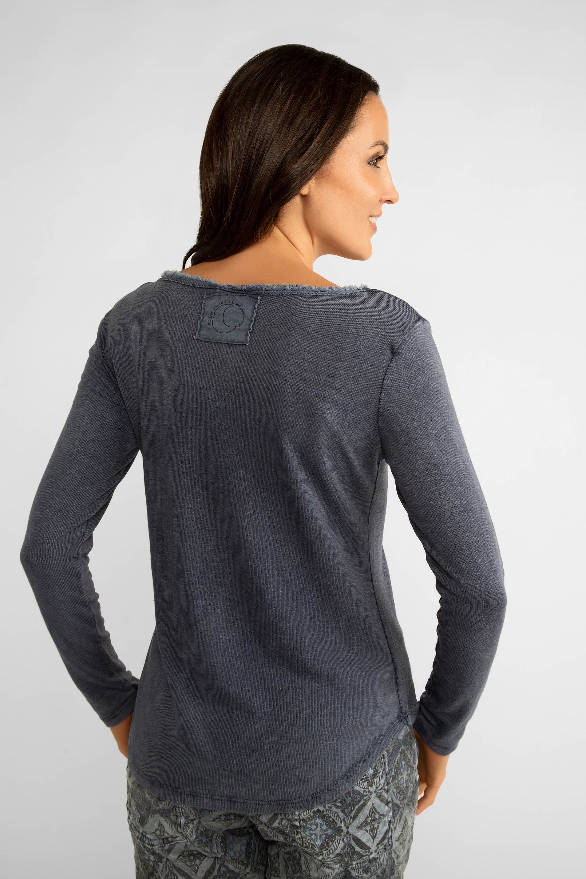 Back view of Elissia (CT2258) Women's Long Sleeve V-Neck Top with Frayed Trim in Jeans blue