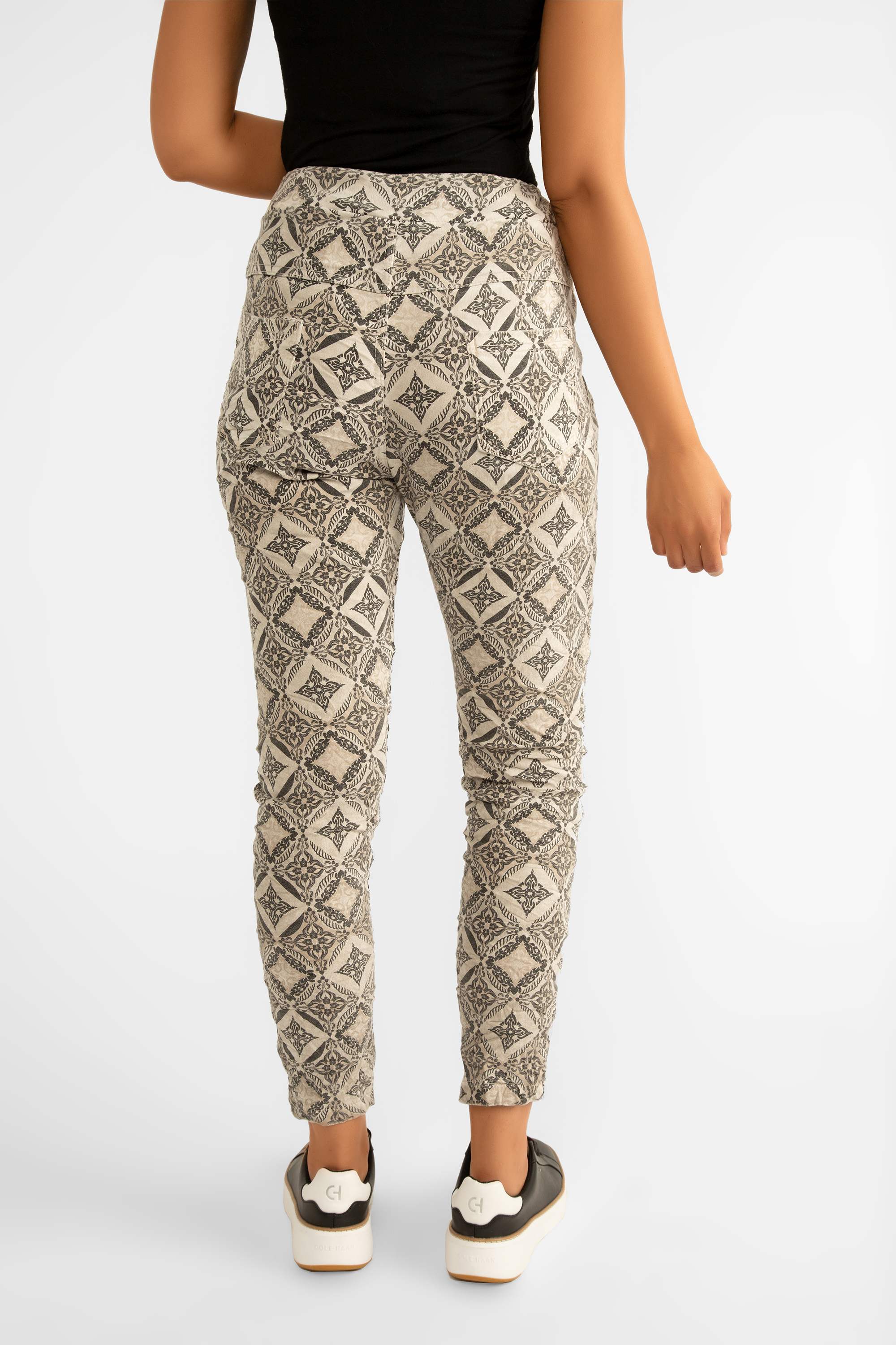 Back view of Elissia (GM6175-4) Women's Cropped Slim Fit Jogger Pants with Pockets and Adjustable Drawstring Waist in a Beige Mosaic Tile Print