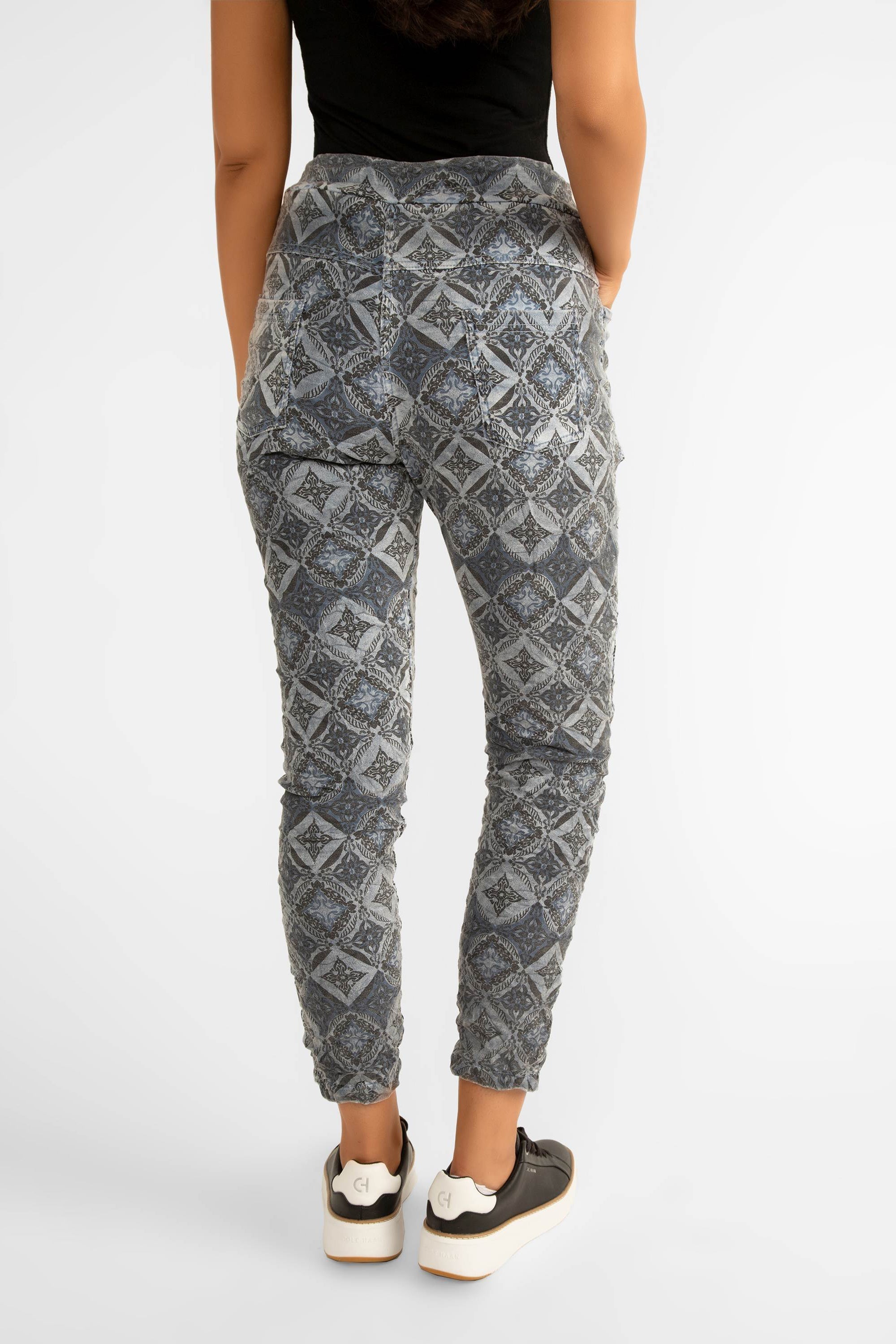 Back view of Elissia (GM6175-4) Women's Cropped Slim Fit Jogger Pants with Pockets and Adjustable Drawstring Waist in a Blue Mosaic Tile Print