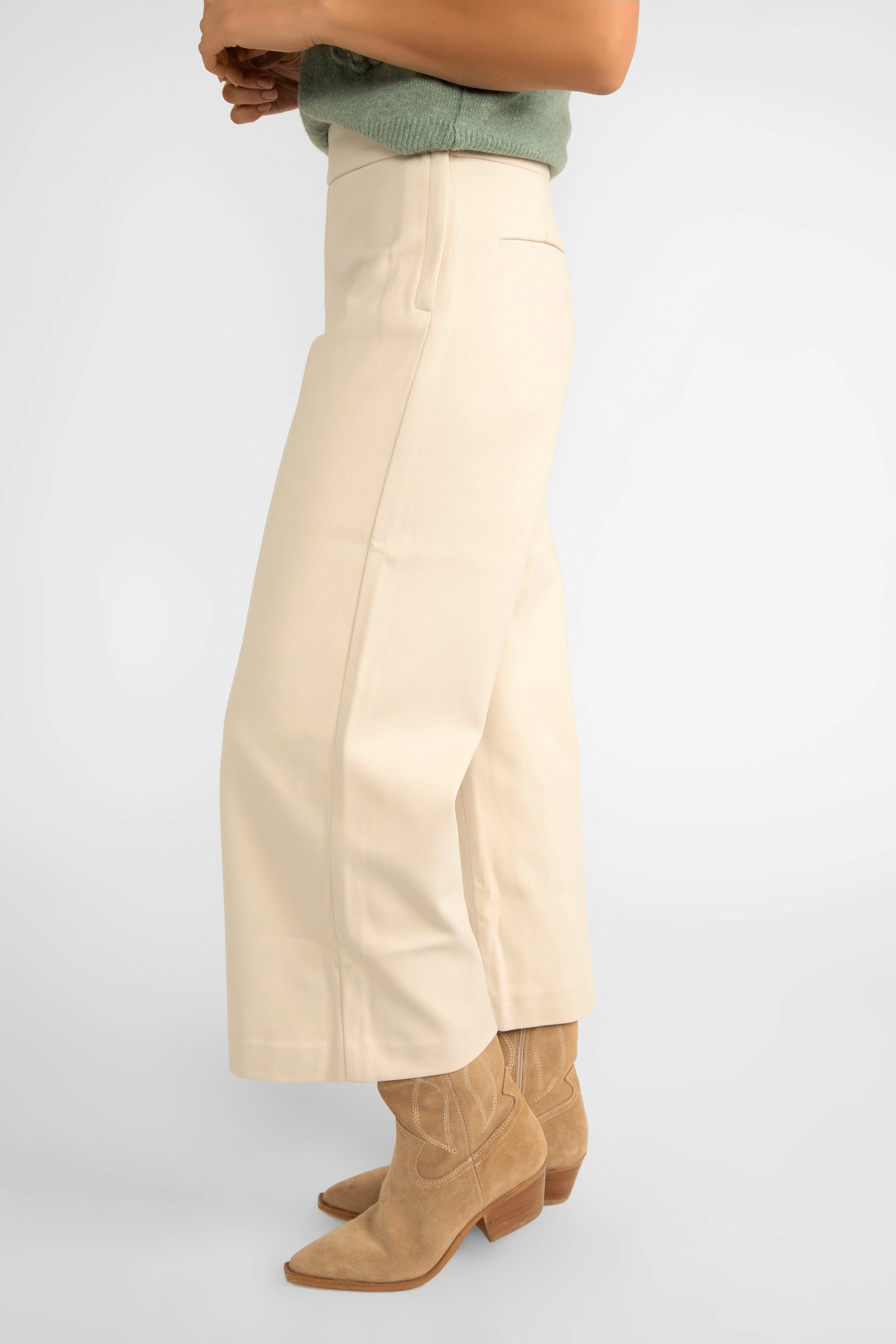 Side view of Pink Martini (PA-41198F24) Nadia Pants - Women's Wide Leg Cropped Pants with Suede link texture in Off White