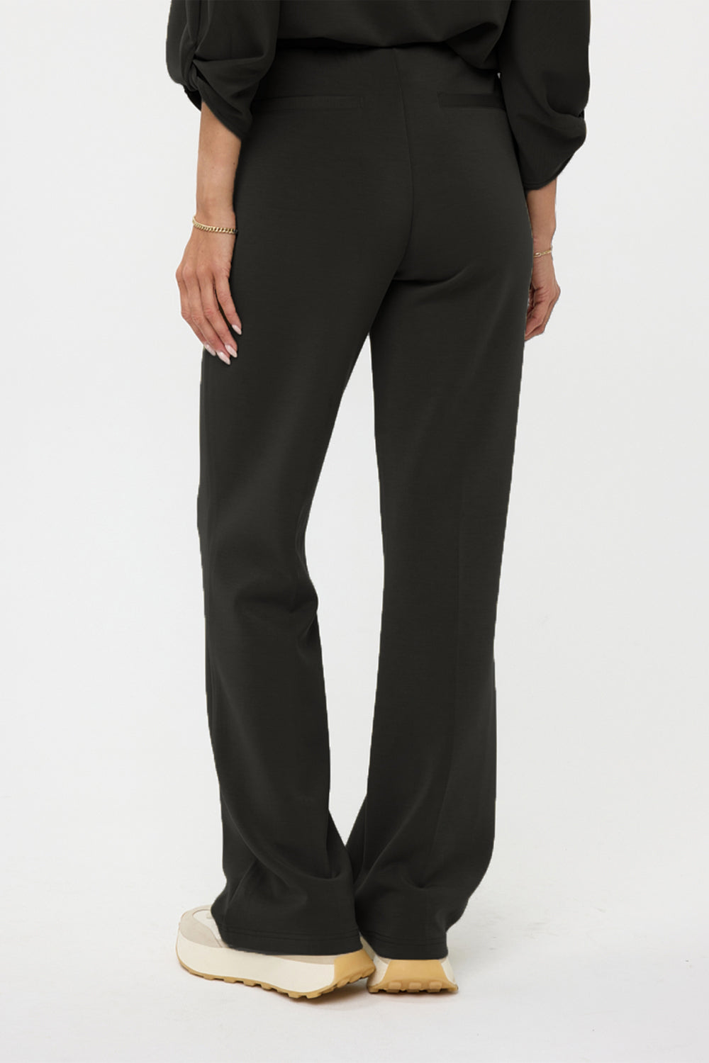 Back view of Esqualo (F2405506) Women's Flared Modal Blend Pants with Pockets in Black