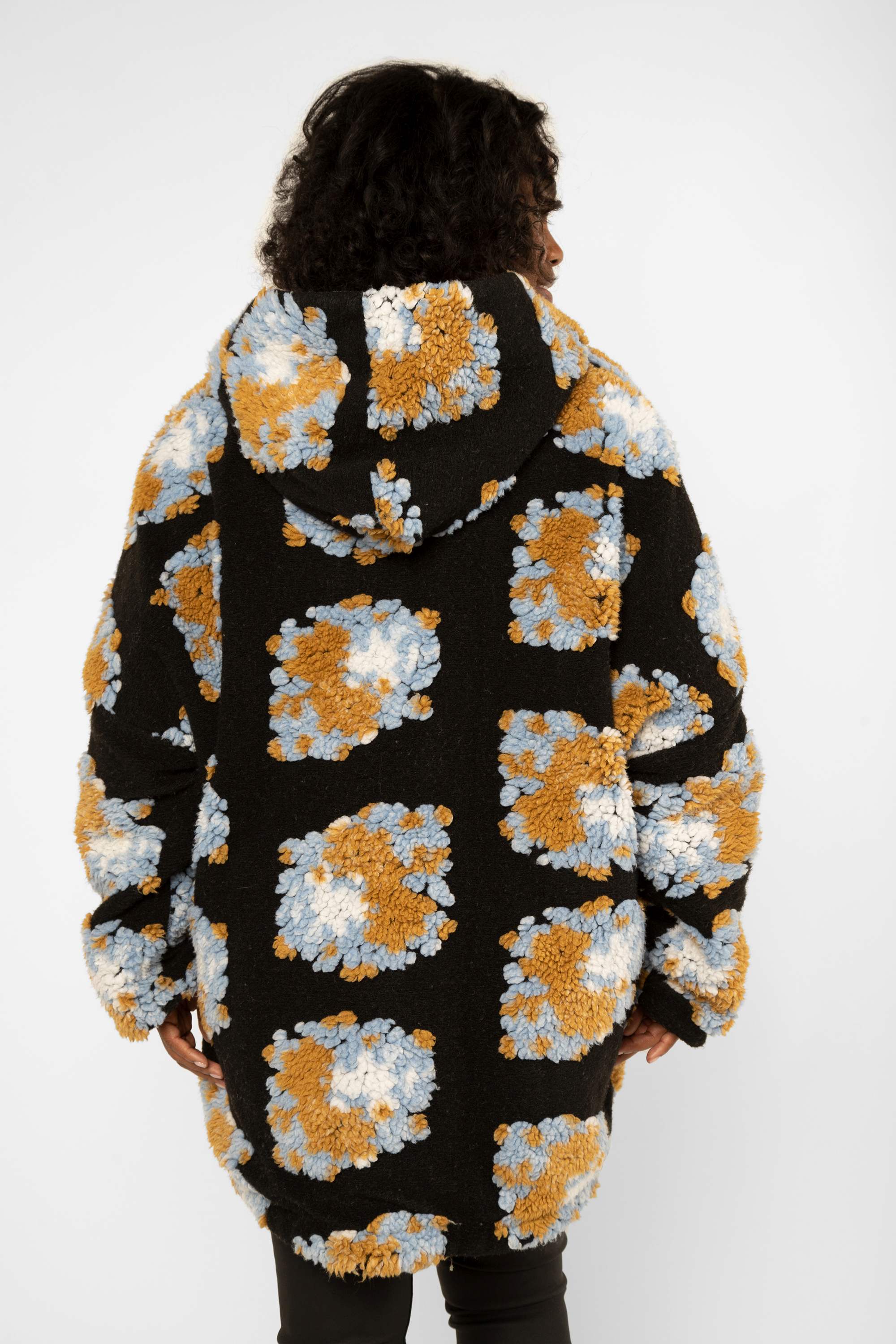 Back view of Fashion Concept (FC243244) Women's Oversized Reversible Hooded Jacket, Knit and Quilted Sides