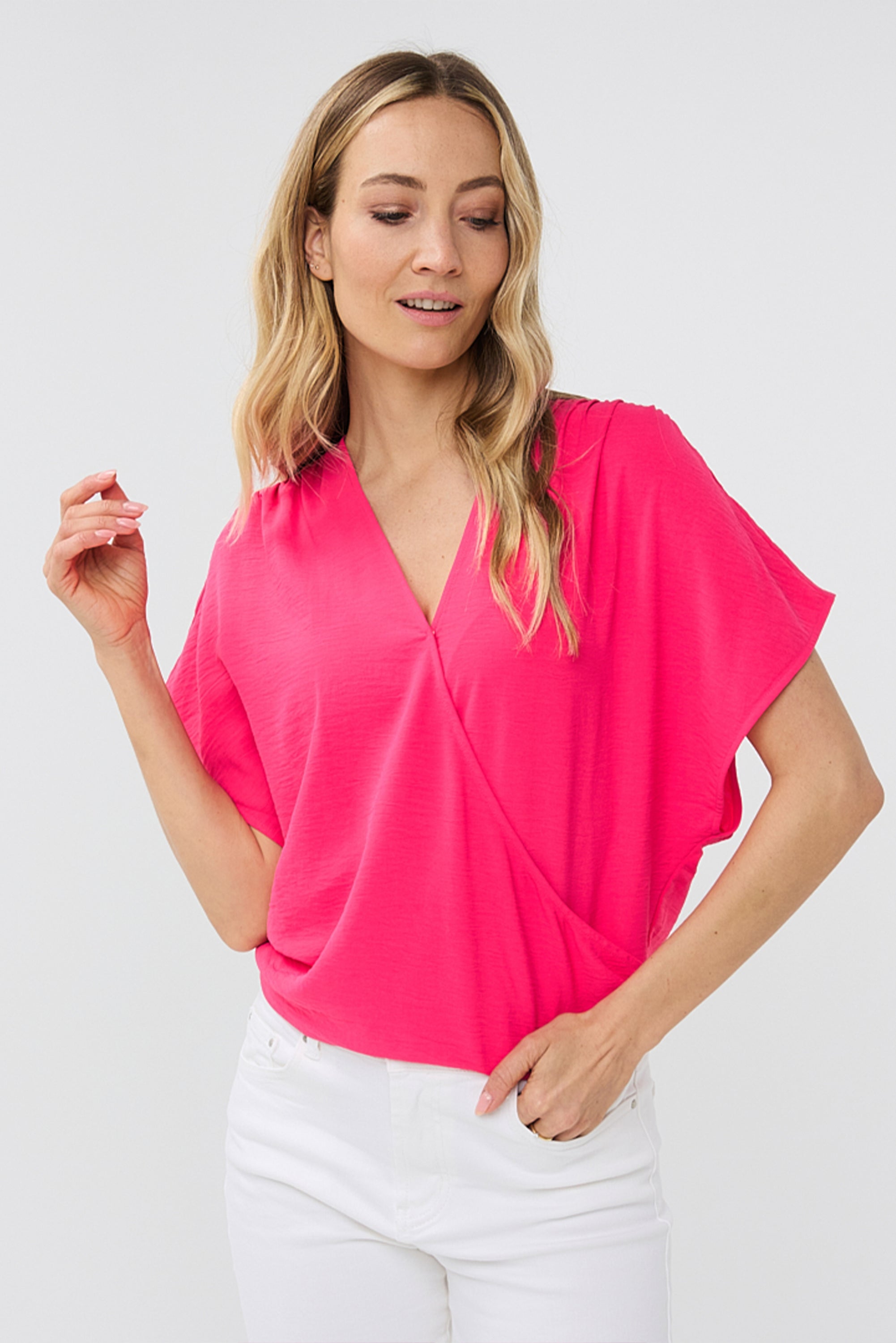 Front view of Esqualo (HS2410217) Women's Short Sleeve Crinkle Fabric Wrap Blouse in Magenta