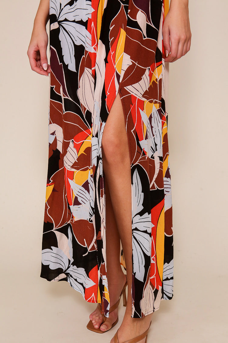 Close up of side split on Timing (MD1572A) Women's Short Cap Sleeve Elastic Waist Maxi Dress With Plunging V-neck in Brown & Multi coloured foliage print
