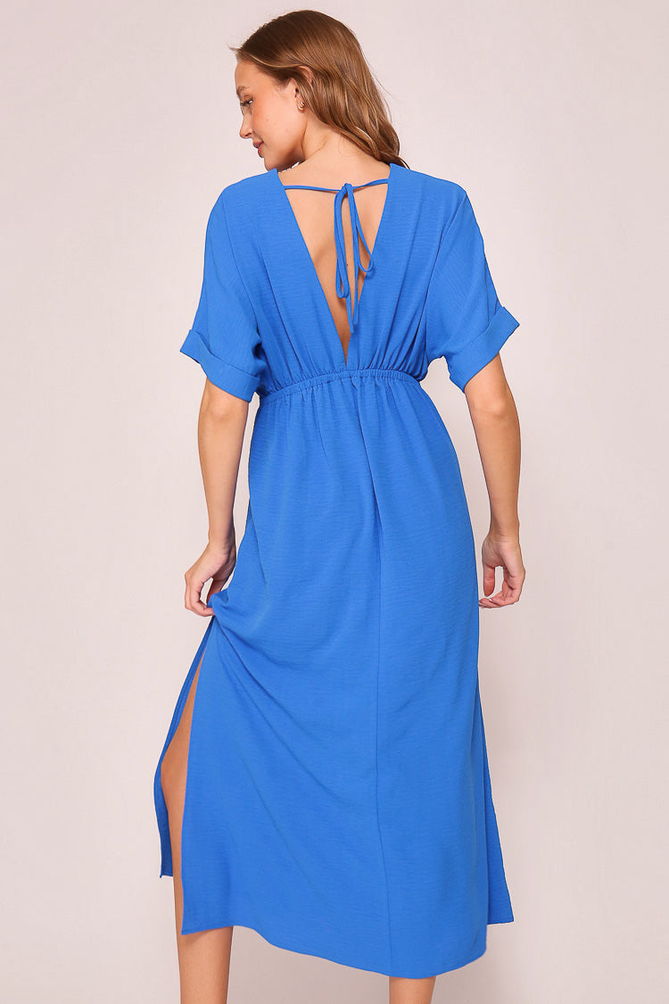 Back view of Timing (MD1924) Women's Short Sleeve Pleated Midi Dress with Plunging V-neck and back with Back Tie in Blue