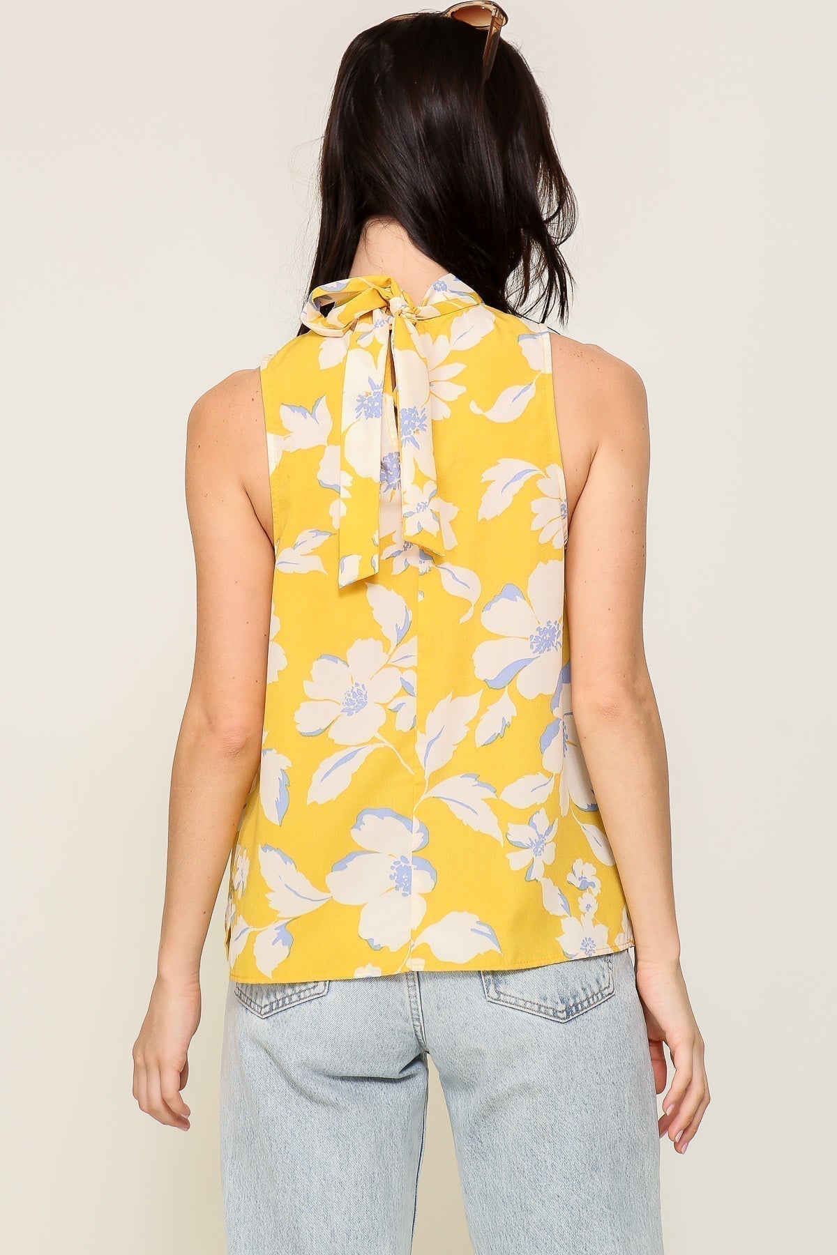 Back view of Timing (MN9462R23) Women's Sleeveles High Neck Floral Print Sleeveless Top in Yellow and Cream print