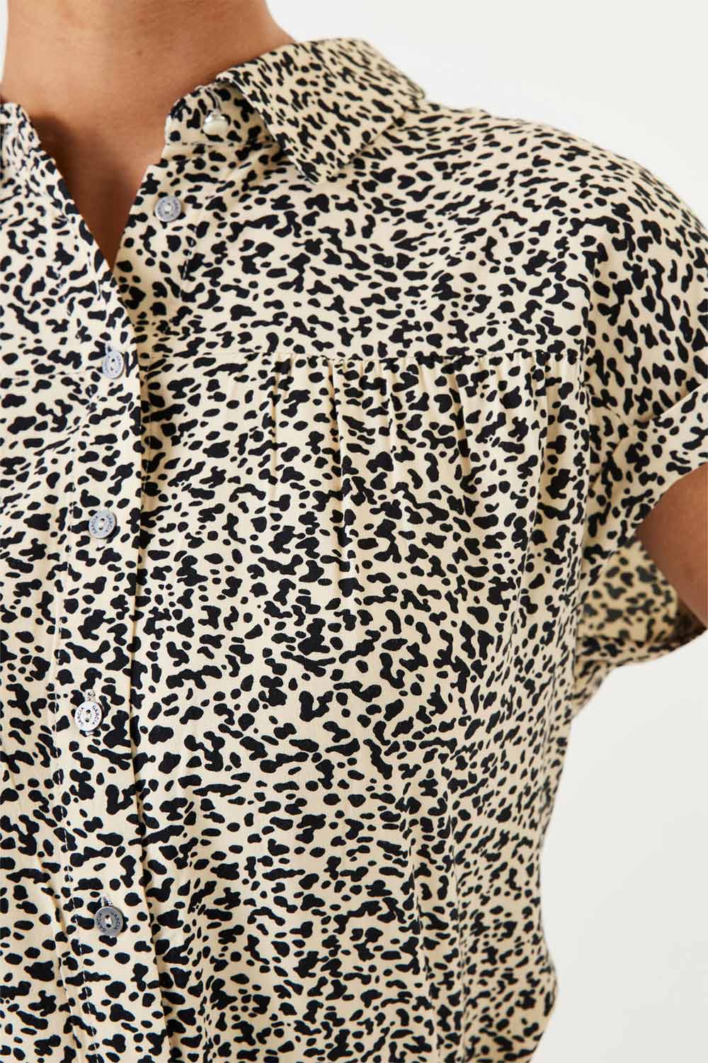 Close up of print on Garcia (Q40031) Women's Short Cap Sleeve Button Up Blouse with Shirt Collar in Leopard Print