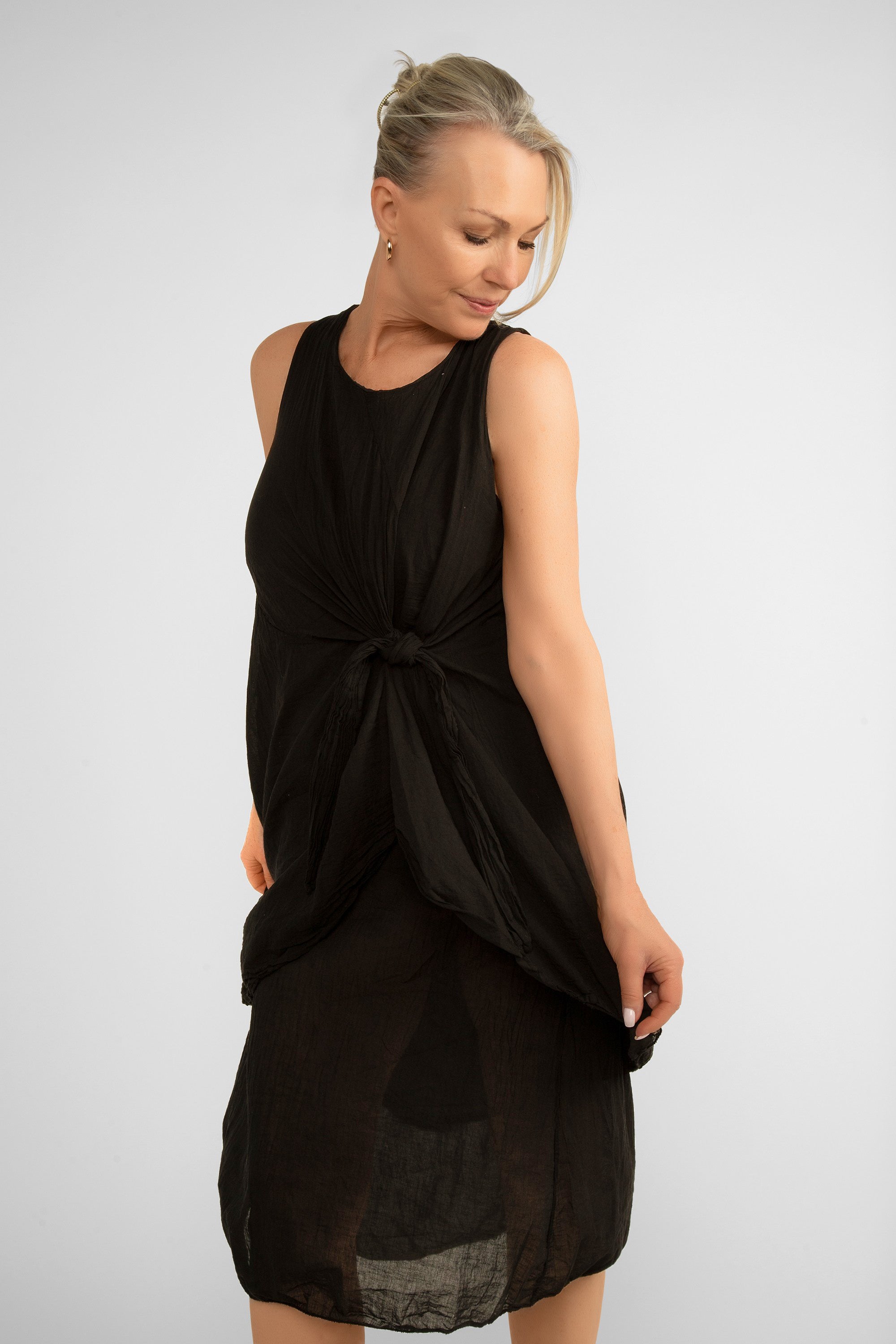 Front view of Me & Gee (12-1208) Women's Sleeveless Front Knot Midi Dress Made from layered cotton in Black