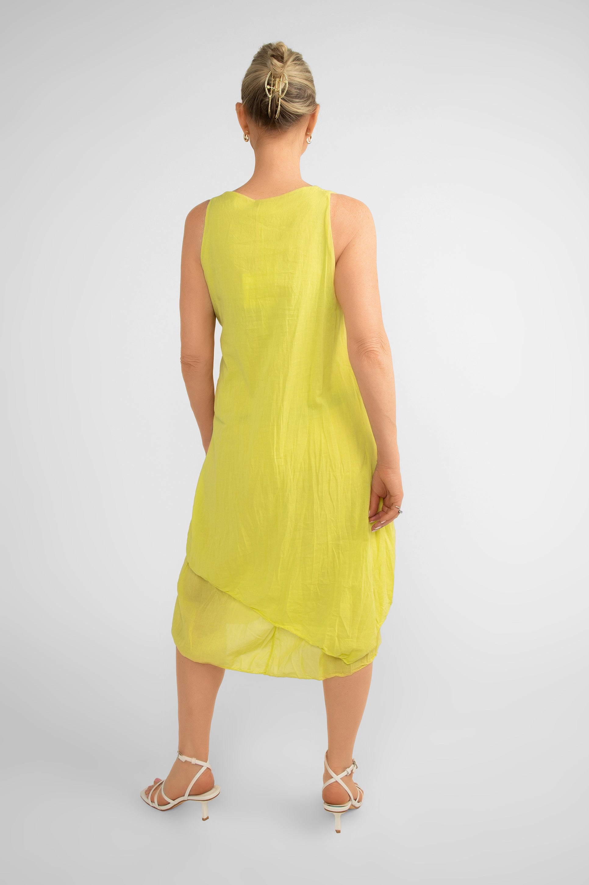 Back view of Me & Gee (12-1208) Women's Sleeveless Front Knot Midi Dress Made from layered cotton in Lime Green