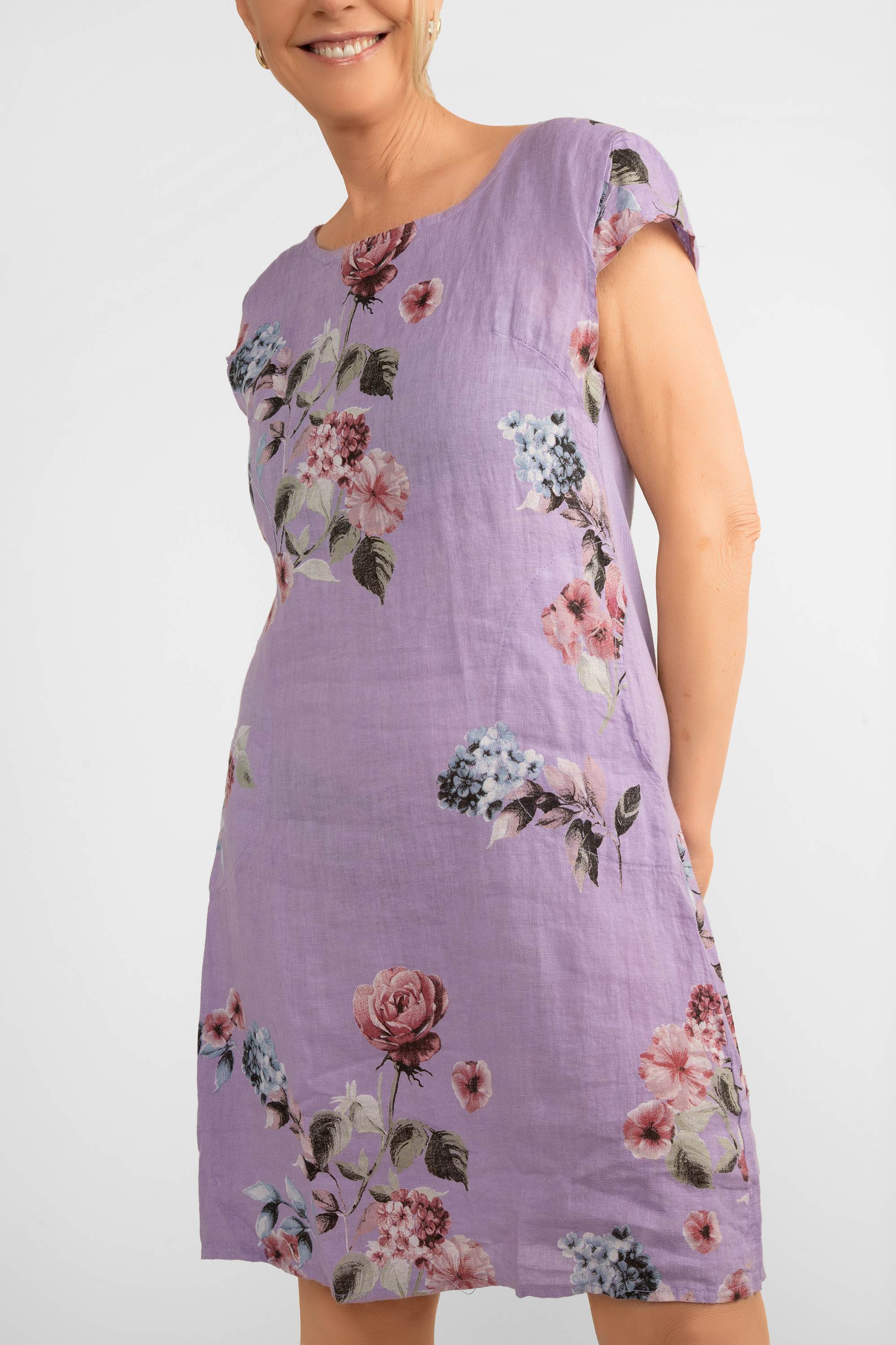 Front close up of Me & Gee (19-7159-FLOWER-S24) Women's Short Cap Sleeve Rose Print Linen Knee Length Dress with Pockets in Lilac Purple