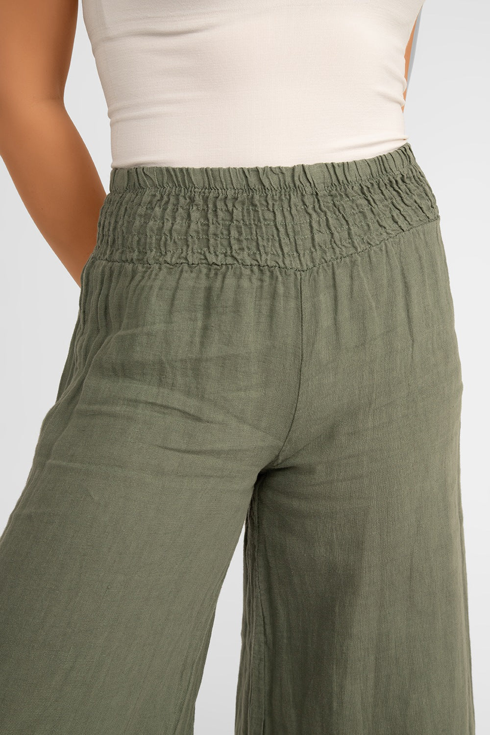 Close up of waist on Me & Gee (19-801) Women's Pull-on Wide Leg Smocked Waist Linen Pants in Military Green