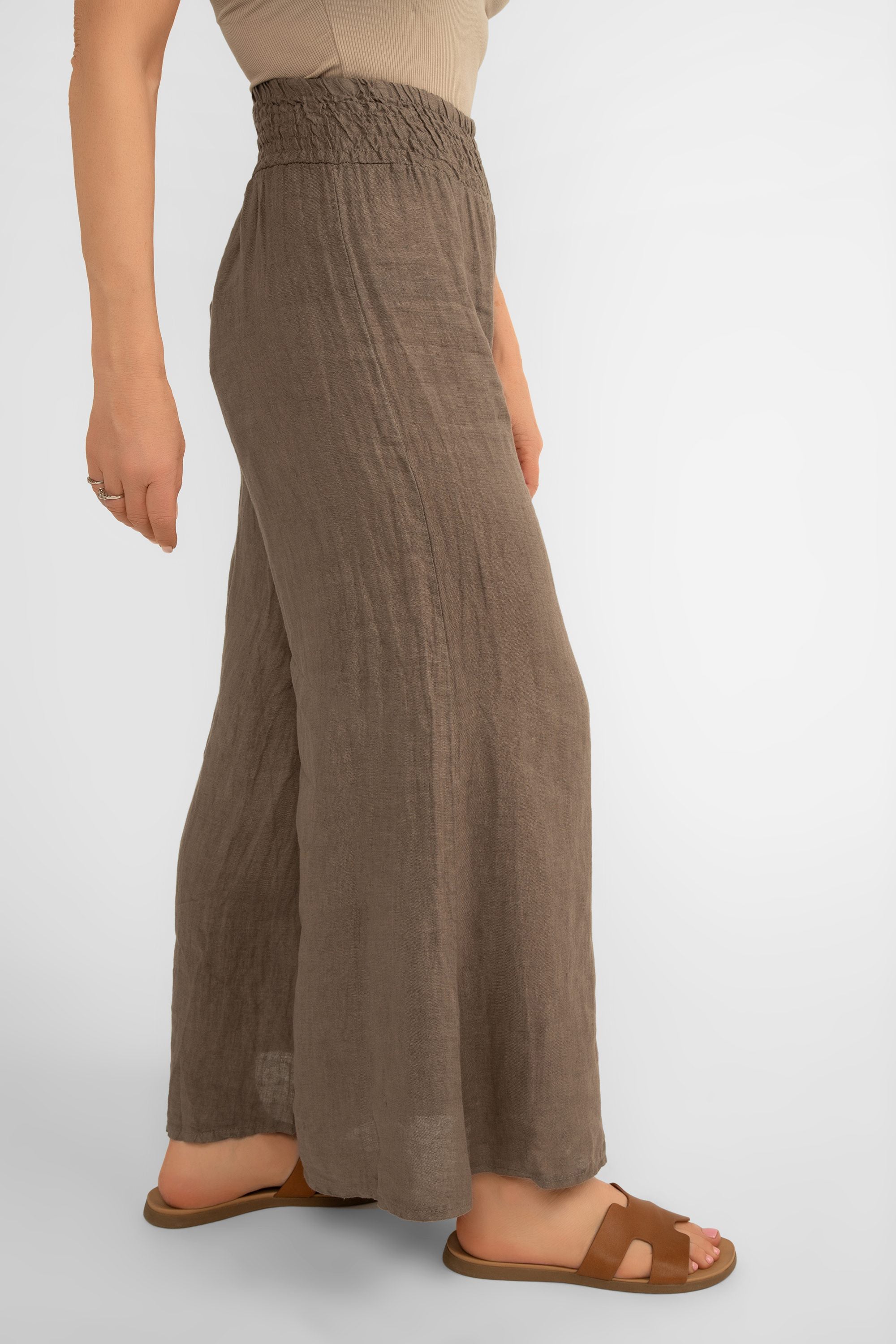 Side view of Me & Gee (19-801-S24) Women's Wide Leg Smocked Waist Linen Pants in Mocha Brown