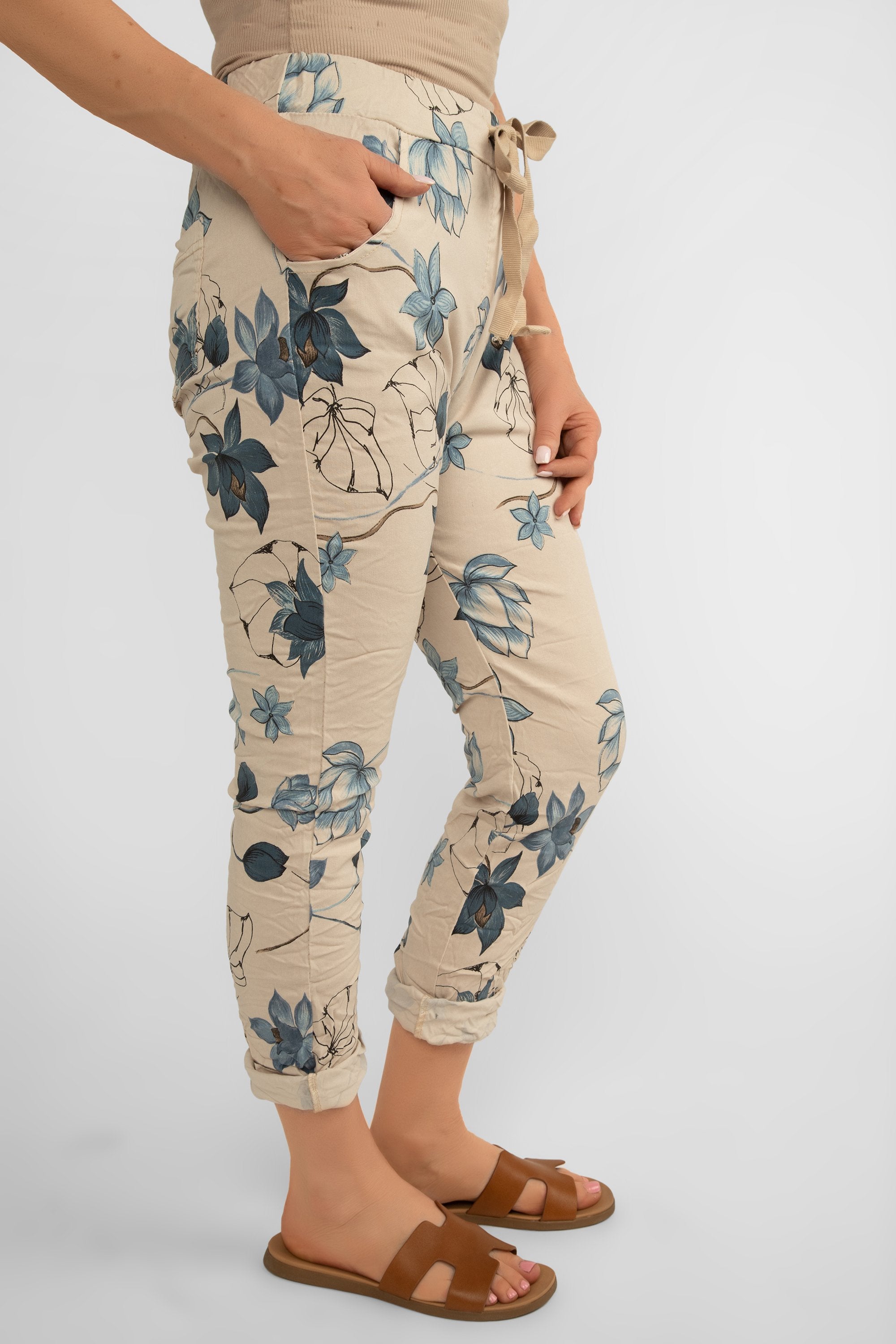 Bella Amore (21036) Women's Pull On Crinkle Pants with Side Pockets, Rolled Hem, and Blue Lotus Flower Print in Beige