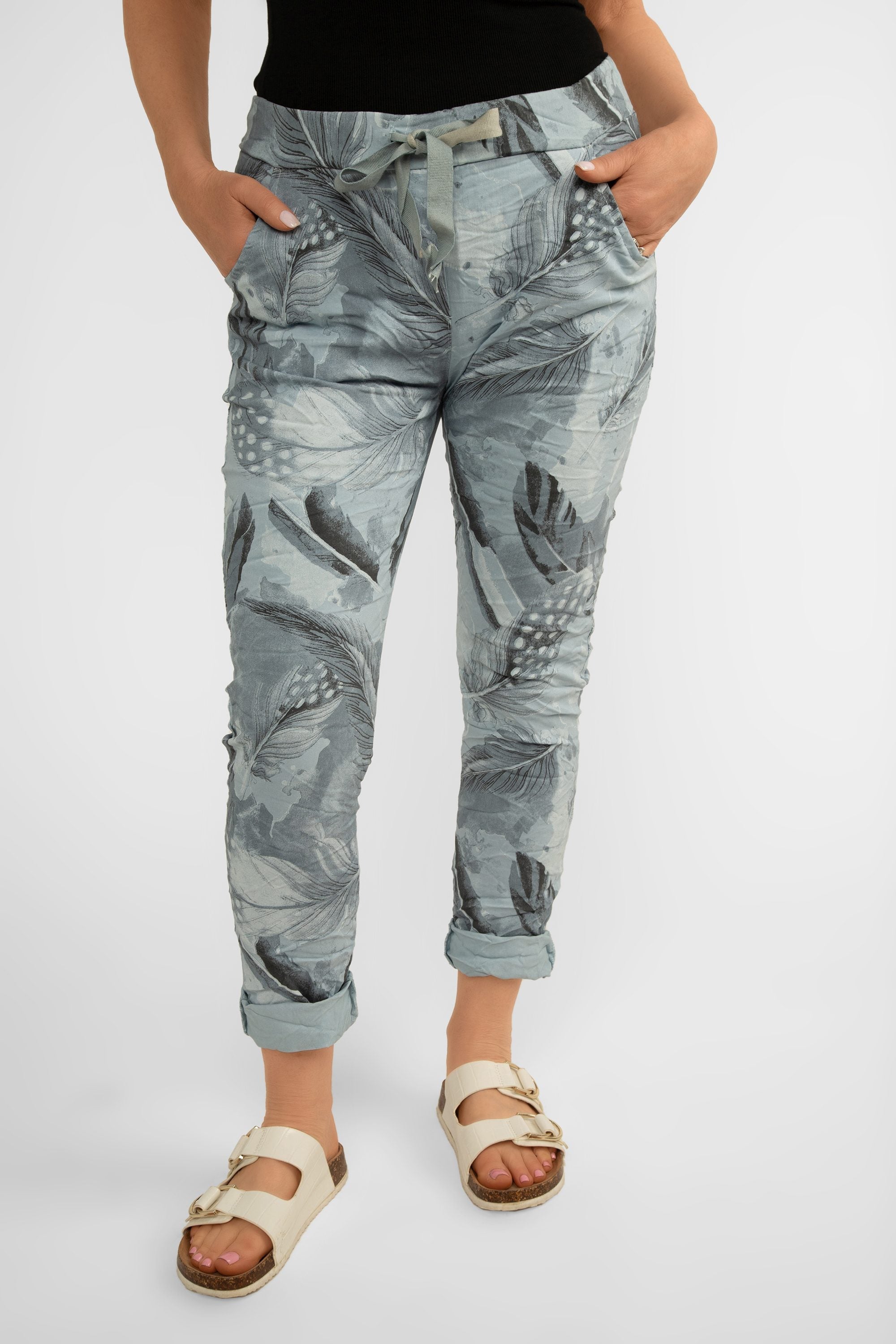 Front view of Bella Amore (21144) Women's Slim Fit Cropped Crinkle Pants with Side Pockets, Pull-on waist in Sky Blue Feather Print