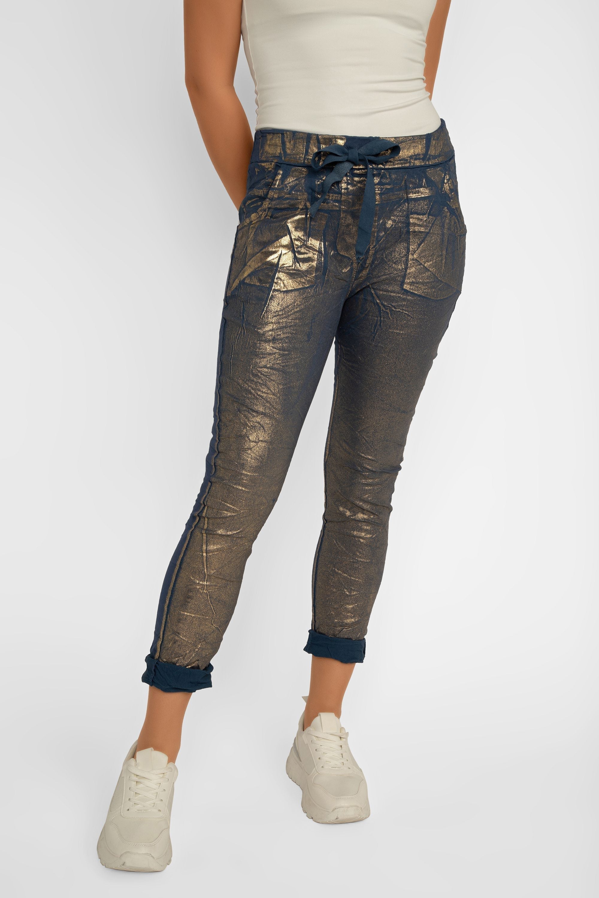 Front view of Bell Amore (21258) Women's Cropped Slim Fit, Metallic Coated Pull On Pants with Pockets in Navy Blue with Gold foil