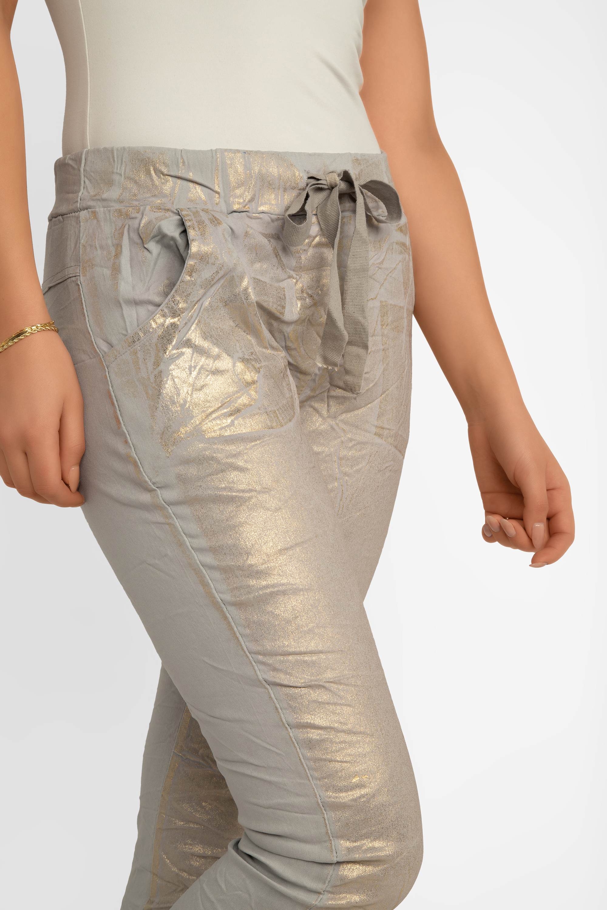 Front close up of Bell Amore (21258) Women's Cropped Slim Fit, Metallic Coated Pull On Pants with Pockets in Light Grey with Gold foil