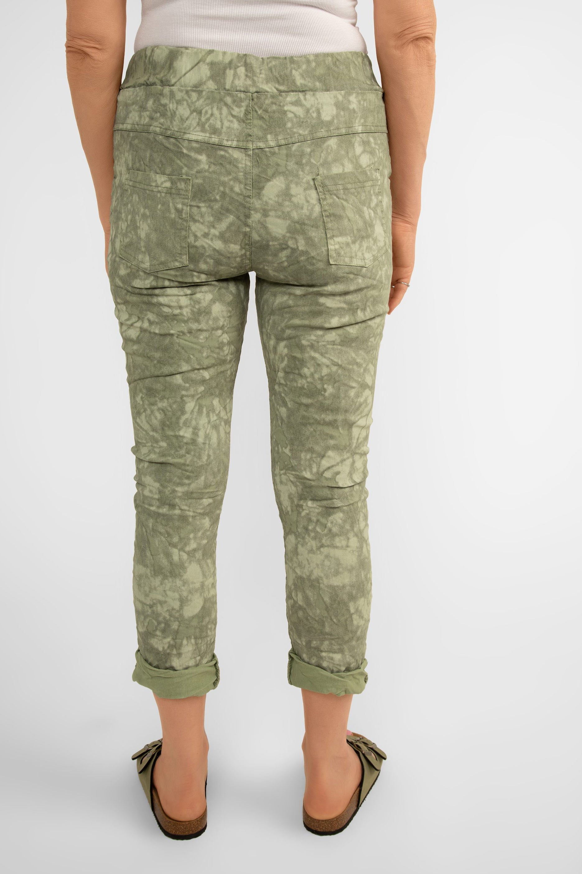 Back view of Bella Amore (21287) Women's Slim Fit Cropped Crinkle Pants with Side Pockets and Drawstring Waist, in Military green tie dye print