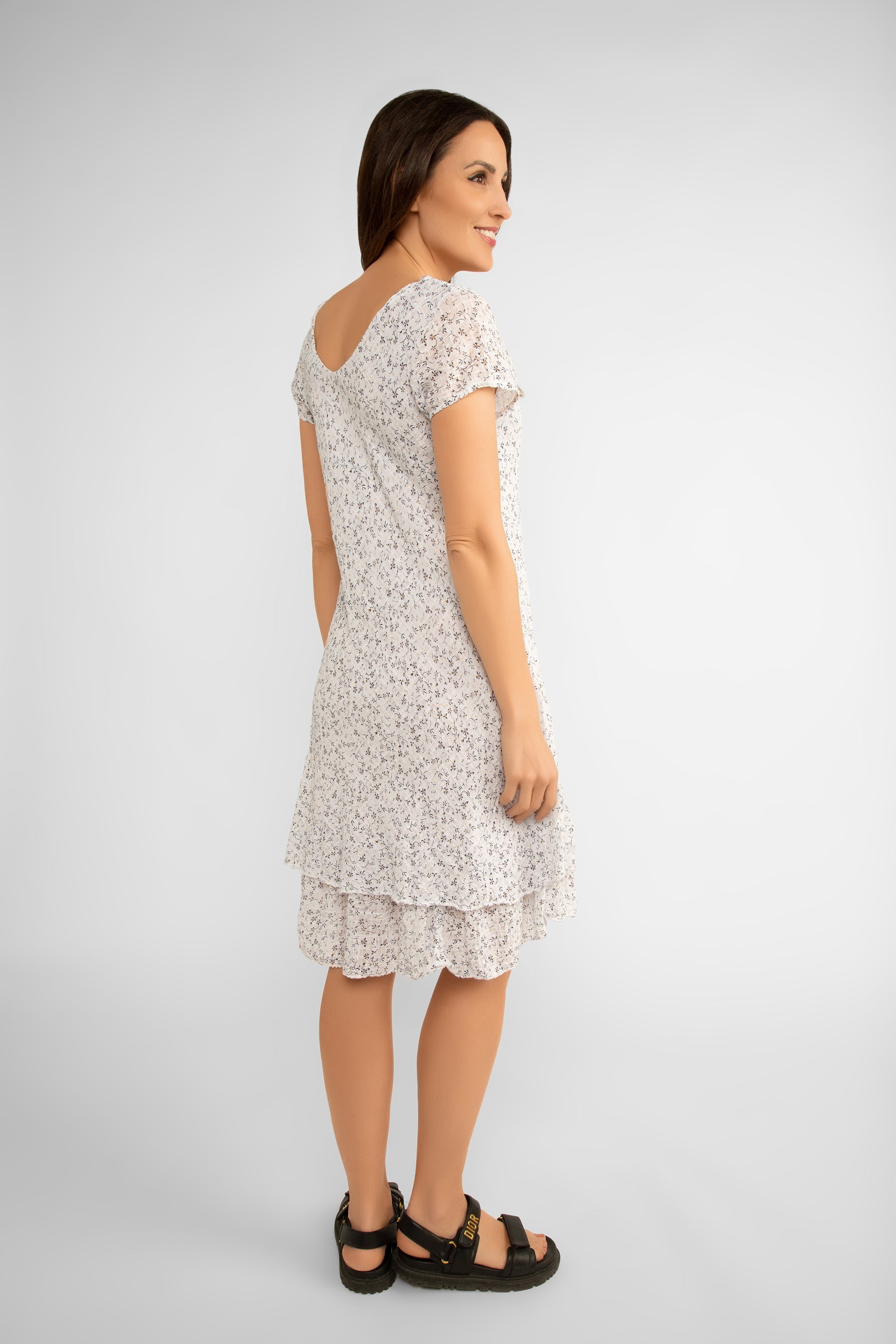Back view of Bella Amore (6859B) Women's Short Sleeve V-Neck Knee Length Skirt in White Ditsy Floral Print