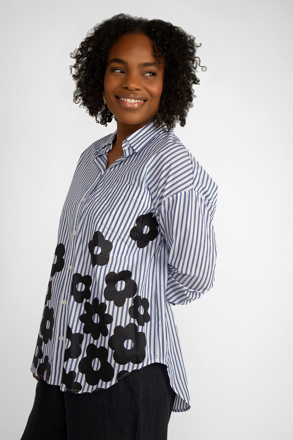 Carre Noir (6866) Women's Long Sleeve Blue & White Striped Button Up Shirt With Black Flowers along the front hem and lower half of the top